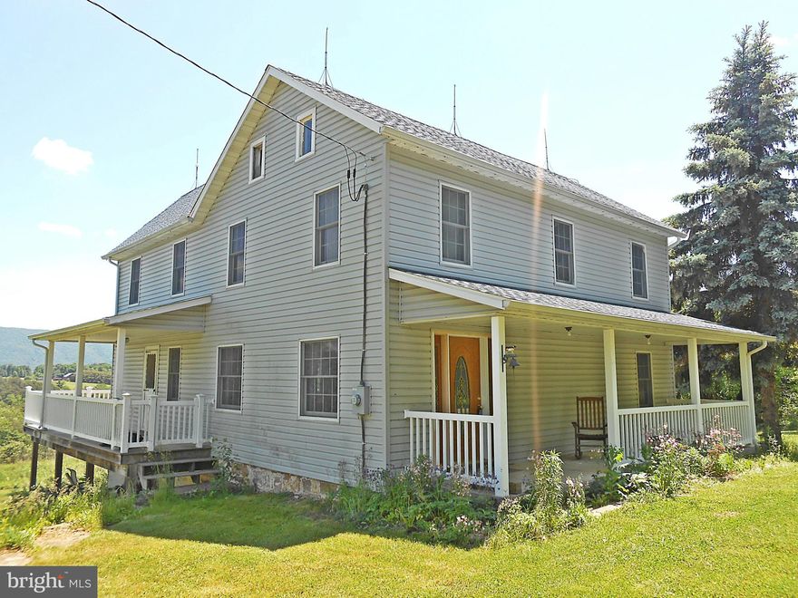 Welcome home animal lovers. Traditional farm style home on just over 17 acres of  rolling, wooded, and private land. Great location for a farmstead or just having room to grow. Ready for play and business with in-ground pool and a detached shop with constructed kennels in the basement space of the shop. Updated kitchen and picture window in family room for taking in the view.