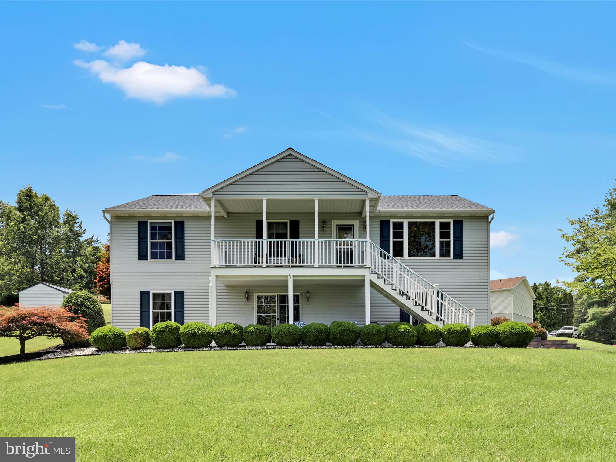 Step into this beautifully maintained 3BR/3BA home on 0.6 acre in the gorgeous, gated Lake Wynonah community. Pride of ownership shines in this spacious 2,688 square foot residence, and an open floor plan creates a seamless flow throughout the living spaces, all enhanced by bright, neutral paint tones that let natural light dance across the rooms. The heart of the home features upgraded quartz countertops in the kitchen, while two propane fireplaces add warmth and ambiance to your everyday living. The primary bedroom offers a true retreat with its en suite bathroom and generous walk-in closet, providing the perfect sanctuary after long days. A dining area, living room, laundry area and an additional bedroom and bathroom complete this floor. A fully finished basement boasting a large family room, bedroom and full bathroom plus utilities offer even more space to relax and unwind. Outside, this property truly excels with dual driveways and a two-car garage complemented by an additional shed for all your storage needs. The outdoor entertainment possibilities are endless with a deck featuring a retractable Sunsetter awning and a separate covered patio area. Thoughtful landscaping showcases beautiful peonies, a stunning Japanese maple, and well-manicured boxwoods, all connected by extensive hardscaping that creates visual interest year-round. Practical updates include a newer water heater, owned propane tank, and a recently installed roof (March 2025) with a transferable warranty. As an added bonus, catch those delightful peek-a-boo lake views that remind you of the natural beauty surrounding this well-positioned home.This property represents the perfect blend of indoor comfort and outdoor living, where quality construction meets thoughtful design. Every detail reflects the care and attention this home has received, making it ready for its next chapter with new owners who will appreciate its many delightful features. Lake Wynonah is a gated community, featuring 2 gorgeous, pristine, spring-fed freshwater lakes (Lake Wynonah is approximately 90 ft. deep and Fawn Lake 45 ft. deep at deepest areas). Amenities include: business office/gathering room/library, lodge w/dining and bar, social clubs, boating, fishing, wakeboarding, waterskiing, tubing, paddleboarding, tennis, pickleball, several parks/pavilion, basketball courts, horseshoe pits, 2 pools, beautiful docks, hiking, natural wildlife and marina. Groups and events include: Active Civic Association, Dances/Concerts, Book Group, Pinochle Group, Volunteer Programs, Fish & Boat Group. Located less than an hour from Allentown, Harrisburg, Hershey and Reading. Close to Philadelphia and surrounding suburbs. Beat the beach traffic and settle in at the lake. Lake Wynonah is "Life On Vacation"!