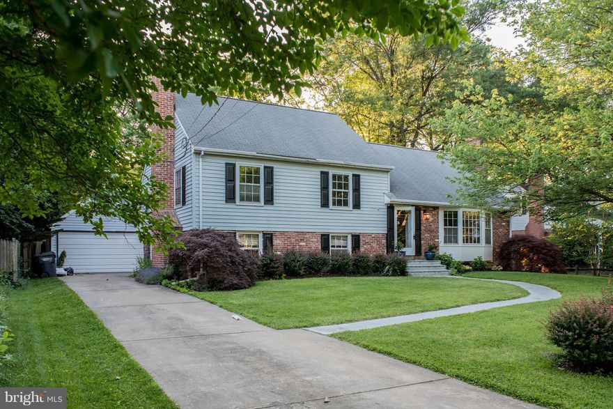 Open floor plan in sought after Waynewood! Huge 5 level split boasts rare 2 car garage and sunroom additions. Chefs kitchen provides a seamless flow to living and dining areas. Renovated master bath offers expanded shower and lux custom touches. Large 4th floor bedroom and walk-up attic offer expansion potential(not shown). Steps from the school, pool and GW Parkway. Truly the best of Waynewood!