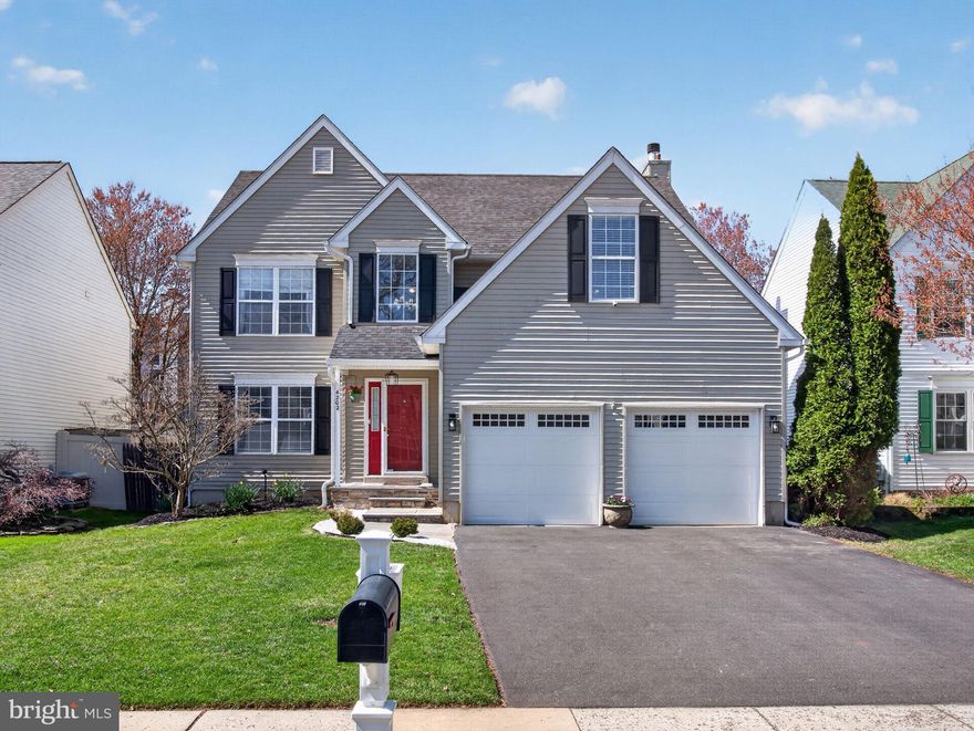 Welcome to this beautifully appointed 4-bedroom, 2.5-bath Colonial that blends timeless charm with thoughtful modern updates. Rich hardwood floors flow throughout the home, complemented by elegant architectural details including crown moulding, wainscoting, custom trim work, and built-ins that add character and sophistication. The main level offers a spacious and functional layout featuring a welcoming living room, formal dining room, and a cozy family room with a wood-burning fireplace. The heart of the home is the eat-in kitchen, designed for both everyday living and entertaining. It boasts granite countertops, a gourmet range and hood, and a sunlit dining area with built-in benches surrounded by windows. French doors in the family room lead to a composite deck and brick patio, seamlessly extending your living space outdoors—ideal for relaxing, entertaining, or play. The fenced backyard is a true retreat, complete with a shed with electricity for additional functionality. Upstairs, the primary suite offers a peaceful escape with a sitting room, walk-in closets and an ensuite bath featuring a soaking tub and a stall shower. The separate sitting room with a charming window seat adds versatility and comfort to the primary bedroom. Three additional bedrooms complete the second level with two of the bedrooms featuring window seats with built-in storage, combining style with practicality. Convenience continues with a large first-floor laundry room that includes interior access to the attached 2-car garage, which offers additional storage space. The partially finished basement expands your living space with entertainment and recreation areas, and storage. This home perfectly balances classic design with modern amenities, offering comfort, functionality, and space for every lifestyle. Updates include: roof 2021, HVAC 2018, kitchen countertop, range and hood, bathroom countertop and vanity, lighting, composite deck, hardwood floors, bluestone walkway. Located in the Central Bucks School District and minutes from shopping, entertainment, the arts, museums, parks, restaurants and transportation, including the Doylestown Train Station. Come see this beautiful home and let it welcome you home!