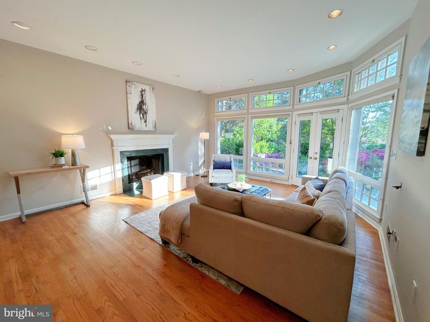 Tucked away in this sought-after Chesterbrook neighborhood, you'll find this exceptional 4-bedroom, 4.5-bath home situated on a beautifully treed .49/acre lot, offers privacy, space and exceptional indoor-outdoor living. A welcoming foyer opens to formal living and dining rooms, setting the tone for both everyday comfort and elegant entertaining. The expansive living room with a wood-burning fireplace flows seamlessly into a sun-filled family room with wood-burning fireplace, large windows and French doors that open to serene views of the backyard. At the rear of the home, a stunning garden room steals the show—complete with a wet bar, wine cooler, custom built-ins, and a full bathroom—making it the perfect space for entertaining or unwinding while enjoying views of the outdoors. Adjacent to the dining room, the gourmet kitchen features an island with bar seating, cooktop, double wall ovens and ample cabinet space. Just off the kitchen, a cozy den/office area with a fireplace and large picture window offers direct access to the backyard oasis. The upper level offers two private primary en suites, thoughtfully positioned on opposite sides of the home. Two additional spacious bedrooms—one with a loft—share a full hall bath. The original primary suite is highlighted by skylights, a spa-like bath with soaking tub, walk-in shower, dual vanities, and a generous walk-in closet. The additional spacious primary suite features stairway off the kitchen and den/office area with en suite with frameless shower and skylight. The lush, expansive yard is a true retreat, surrounded by mature greenery and featuring tranquil ponds and a swimming pool—ideal for relaxation, recreation, and outdoor gatherings. The laundry is conveniently located in a closet space in the garden room area. The garage entrance is off the kitchen with additional storage space. Ideally located close to the heart of McLean and the Chesterbrook Shopping Center, this home combines privacy, convenience, and timeless appeal in a truly special setting. Chesterbrook, Longfellow, McLean Schools!