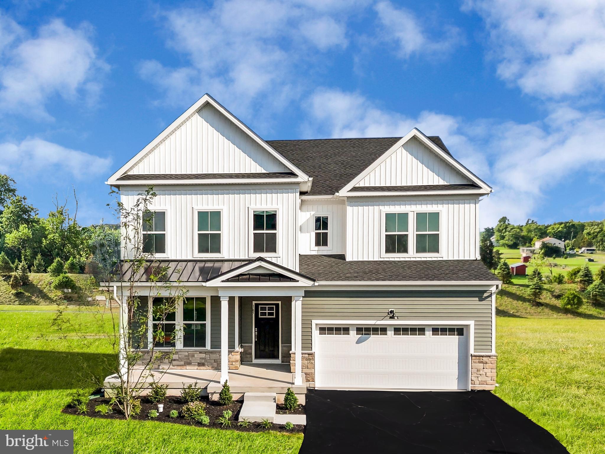 **October Delivery!** Welcome to 130 Steiner Way our new Farm View community, located in the Perkiomen Valley School District. This stunning Dalton Farmhouse home offers 4 spacious bedrooms, 4.5 baths, a 2-car front entry garage, and a generous 3,873 square feet of beautifully designed living space. From relaxing on your spacious farmhouse front porch, enjoy the peaceful tranquility of your surroundings. The gourmet kitchen, featuring White, cushion-close 42" Century cabinets, elegant Carrara Breve kitchen quartz countertops, and a striking Fawn gloss kitchen backsplash. Stainless steel appliances are included for your convenience. The luxury vinyl flooring throughout the first floor provides both style and durability. Relax in the spacious family room with a cozy fireplace or enjoy your morning coffee in the calming sunroom, which offers impressive views of the Perkiomen Valley Trail and private surroundings. The flex space and office on the first floor provide endless possibilities for work, study, or play. Upstairs, the primary bedroom is a peaceful retreat with a tray ceiling and an en-suite bath, featuring elegant 12x24 ceramic tile. The second bedroom boasts its own princess/prince suite, providing extra privacy and comfort. The 3rd and 4th bedroom, hall bath, and convenient laundry complete the upper level. On the lowest level, the finished basement offers additional space for entertaining or storage, complete with a full bath for added convenience. Located just minutes from outdoor recreation, Route 422 for easy commutes, Philadelphia Premium outlets for shopping, dining, and the vibrant nightlife of Skippack, this home perfectly balances peaceful living with easy access to everything you need. Enjoy the quiet charm of Farm View, while being close to all the conveniences of modern life!
*Please note: Scheduled appointments are encouraged. If using a Realtor, Realtor must be present for first showing. Exterior photo is actual home. Other photos are for representational purposes only. Details and selections will vary. See sales team for details. Taxes to be assessed after settlement. For open houses, please visit the model home.*