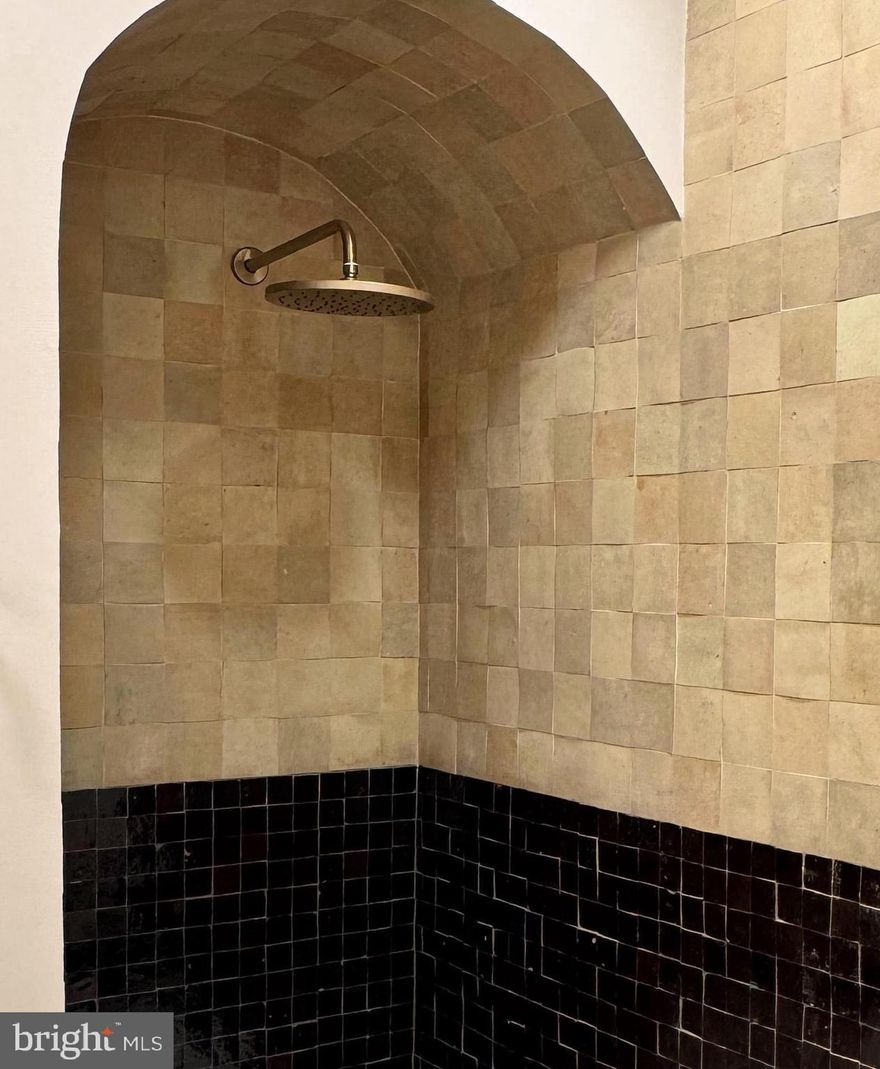 Welcome to 811 Pierce Street, a beautifully renovated 4-bedroom, 2.5-bathroom home located on a charming, tree-lined block in the heart of East Passyunk, one of Philadelphia’s most vibrant and sought-after neighborhoods. This thoughtfully designed residence blends rare and stunning designer finishes with a flexible and highly livable layout. The bright first floor features an open living and dining area that flows into a custom eat-in kitchen with stainless steel appliances, ample cabinetry, open shelving, and a large island with seating, along with a light-filled breakfast area overlooking the yard. The rear of the first floor also features a convenient powder room. The second floor offers three bedrooms, a full bathroom, and a well-positioned laundry area with built-in cabinetry for everyday convenience. The entire third floor is dedicated to a serene primary suite, with large skylights and windows that flood the space in natural light. It includes a walk-in closet, a generous spa-like bathroom with 2 showers, soaking tub, and a double vanity, as well as a wet/dry bar, and access to a private walk-out deck—creating a true retreat within the home. The finished basement provides valuable additional living space or storage, while the spacious backyard—rare for the neighborhood—offers plenty of room for outdoor entertaining, gardening, or relaxing. Just steps from the restaurants, shops, and energy of Passyunk Ave with easy access to Center City and transit, 811 Pierce Street offers the perfect combination of modern design, comfort, and location. Full 10-year tax abatement pending approval.  OFFER DEADLINE - HIGHEST AND BEST OFFERS ARE DUE ON SUNDAY 3/29 AT 10:00PM.