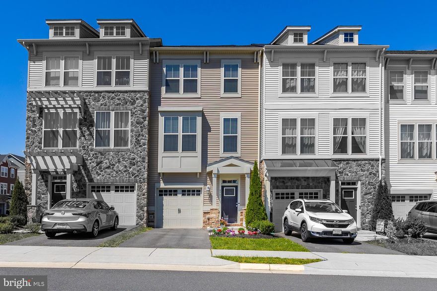 Highly Sought- After Bradley Square! 9Ft+ Ceilings, 2,485  SQFT, 1 Car Garage 3 Finished Levels, Large Rear Deck With 6" Ext, Hardwood Floors on  Main Level & Main Floor  Foyer & Hall Way, Designer Kitchen with Granite Counters, With large Island , Stainless Appliances, Maple Cabinets,  Formal Living Room, Formal Dinning Room,  Arts & Crafts- Style Railings Throughout, Owner's Suite With Luxury Bathroom with 2 Closets,  Upper Level Spacious Bedrooms, Lower Level Spacious  & Open with Walk Out To Backyard. Ring System Conveys With Home. Close to Shopping & Restaurants