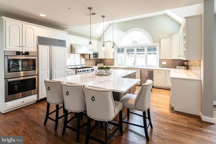 Are you looking for an exceptionally beautiful home, where you can relax and entertain in a country club setting with gorgeous pool, spa and outdoor living room? You found it! 20 Harrison Drive has been recently updated, including:  a renovated kitchen with white cabinets, new stainless steel appliances, beautiful Calcutta Leon quartz countertops, refinished hardwood floors and freshly painted with designer colors.  This gorgeous home sits on one of the most picturesque lots in coveted Harrison Estate, overlooking the Waterloo Mills Preserve, 170 spectacular acres with panoramic views.  You will be awed by the outdoor entertaining spaces: heated pool installed in 2014, (with automatic, retractable electric cover) raised spa--49 sq. ft., two tiered entertainment patios (one with pergola), a large pavilion with fieldstone gas fireplace and raised flagstone hearth, flat screen TV, dining area, and large playing field.  As you enter the circular driveway, you are welcomed by a fabulous two story reception hall with marble & limestone flooring and sun-filled front to back entrance foyer leading to the pool and patios. To your left is the formal living room with gas fireplace, moldings and french doors to an office with mahogany wainscoting. Adjacent to the study is a formal powder room and a sunroom, with ceramic tile flooring and three walls of windows and french doors to the patio, pool and cabana. To the right of the foyer is an arched entrance way to the dining room with wainscoting and medallion. The butler's pantry with wine refrigerator allows for easy serving. The gourmet kitchen was recently updated and boasts Viking commercial cooktop, Sub Zero built-in refrigerator, Bosch double ovens, Kountry Kraft white cabinets and huge island with new quartz countertop. Open to the kitchen is the sunny breakfast room and family room with gas fireplace, vaulted ceiling and picture window affording an incredible view of the expansive lot. This great floor plan allows for a seamless flow for entertaining, inside and out! A mudroom sits off the breakfast room, complete with cubbies, a half bath, rear stairs and access to the garage. The finished lower level is a great play area with full sized windows and ample storage space. The second level features five bedrooms and four full bathrooms. The master suite includes a sitting room, large bedroom with tray ceiling, his & hers walk-in closets and a master bath with dual vanities with new Crema Marfil marble tops, new light fixtures, large shower and  jetted tub. There are two en-suite bedrooms and two bedrooms that share a jack and jill bathrooms. The spacious second floor landing is a perfect spot for homework at the built-in desk. Third floor is a finished rec room with movie screen (included) and it's own heating/AC system, ideal for a teen hang out or sleepovers. There are two new HVAC systems, a new hot water heater & a Generac 20 kw generator included. The exterior was completely renovated with new cedar shake roof, new Marvin windows & french doors, new Vixen Hill shutters, Wayne Dalton 12 foot custom Wayne Dalton custom wood garage doors, (perfect for SUVs) copper gutters & downspouts, and new Hardie plank siding and stucco. Conveniently located near the towns of Wayne and Newtown Square with the new Whole Foods. Great Marple Newtown Schools and close to private schools, like Episc. Acad.,  Del. County Christian School and ND Academy.  MATTERPORT VIDEO: https://my.matterport.com/show/?m=cc3pbHdUz8f