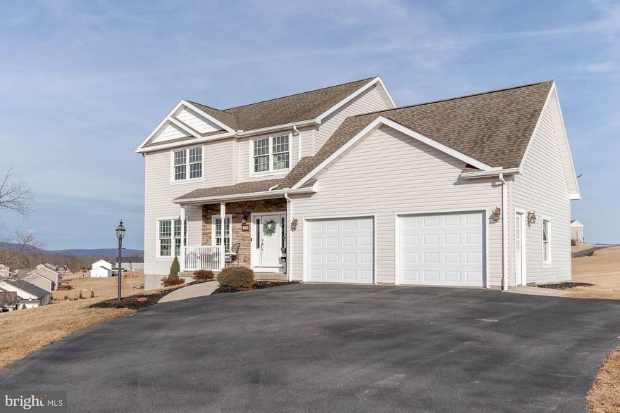 A stunning home on 1.54 acres in desirable Sinking Creek subdivision! This 3 bedroom, 3.5 bath 2-story delivers eye-catching curb appeal, ample natural light throughout, an extraordinary outdoor oasis, incredible views of neighboring Penns Valley mountain ranges, and so much more. The well-appointed, eat-in kitchen features granite countertops, cherry cabinets, gas range, stainless steel appliances, and center island. You will appreciate the layout of the main floor with a light + bright living room, impressive laundry room with custom cabinets, convenient ½ bath, and dining area with easy access to the rear deck with remarkable views. The primary bedroom boasts a stately accent wall, private full bathroom with dual vanity, and an abundance of closet space. Two additional bedrooms and a full bathroom round out the 2nd floor. Retreat to the finished, fully lit lower level for relaxation and entertainment! The striking bar provides a mini refrigerator, sink, and kegerator overlooking the cozy family room with Harman pellet stove, maple Murphy bed, and a full bathroom with tile shower. Find refuge after a long workweek on the secluded patio with a hot tub, pergola, and ambient lighting. Additional highlights include radon mitigation, fresh paint throughout, 9ft. ceilings, convenient first-floor laundry room off of the attached 2-car garage, PEX plumbing, and so much more. A truly magnificent home in a rural setting, conveniently located less than 20 minutes to downtown State College + Penn State campus.