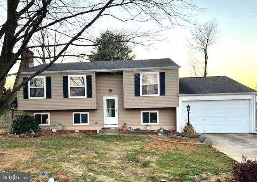 Lovely 4 bedrm 2 full bath Split Foyer with  oversized 1+ car garage (510 sq ft) with fenced back yard with large shed.  Open kitchen area with large island (installed 2021) that  can serve as kitchen table and has cabinets underneath! Newer light fixtures  & kitchen cabinets in 2015; and new laminate flooring  for  upper level installed in 2025.   Also new washer , dryer & refrigerator  in 2025. New Sewer line from inside to the city line connection replaced in 2025.  Siding & gutters replaced in 2019 and 2020 lower deck 12x20 footers for a upper deck were installed in 2021. Champion Windows- all upper floor-2017 ; Roof replaced and electric panel updated-2013 ....these  are  some of the things that has been replaced..  Home has been well loved! 
More inside pictures coming soon!