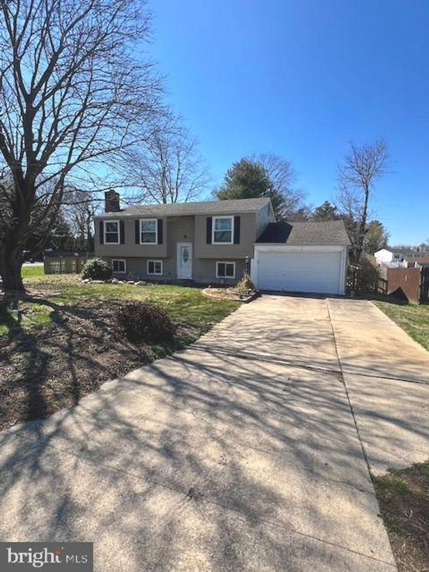 Lovely 4 bedrm 2 full bath Split Foyer with  oversized 1+ car garage (510 sq ft) with fenced back yard with large shed.  Open kitchen area with large island (installed 2021) that  can serve as kitchen table and has cabinets underneath! Newer light fixtures  & kitchen cabinets in 2015; and new laminate flooring  for  upper level installed in 2025.   Also new washer , dryer & refrigerator  in 2025. New Sewer line from inside to the city line connection replaced in 2025.  Siding & gutters replaced in 2019 and 2020 lower deck 12x20 footers for a upper deck were installed in 2021. Champion Windows- all upper floor-2017 ; Roof replaced and electric panel updated-2013 ....these  are  some of the things that has been replaced..  Home has been well loved! 
More inside pictures coming soon!