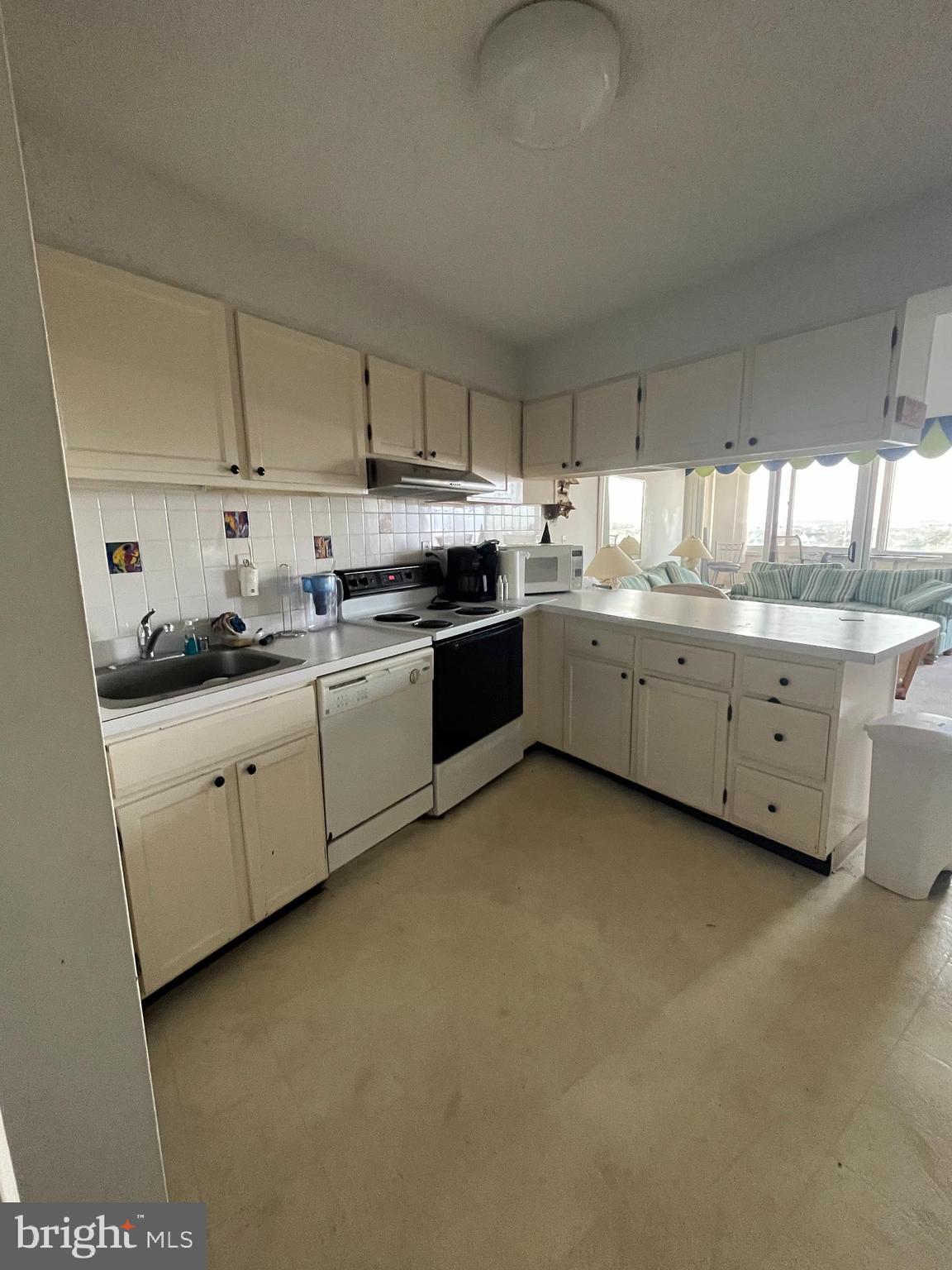 *MASSIVE REDUCTION IN PRICE!!* Motivated seller just reduced the price below the assessed value! Their loss could be your gain, just in time for summer to kick off! Enjoy laid back beach life with the sound of the waves and a salty breeze just steps outside your door! This furnished 2 bedroom 2 full bath unit has views of both the bay and the ocean! Combination kitchen/living room area with an island. Master bathroom has a jacuzzi style bathtub. Hall bath has a stand up shower. Unwind on the enclosed balcony that features full-view sliding, screened in windows and is accessible from the living room and master bedroom. Some amenities include heated pool, sauna and secure lobby with on-site management. Building has installed eco-conscious geothermal heating and cooling ensuring energy efficiency without compromising comfort.