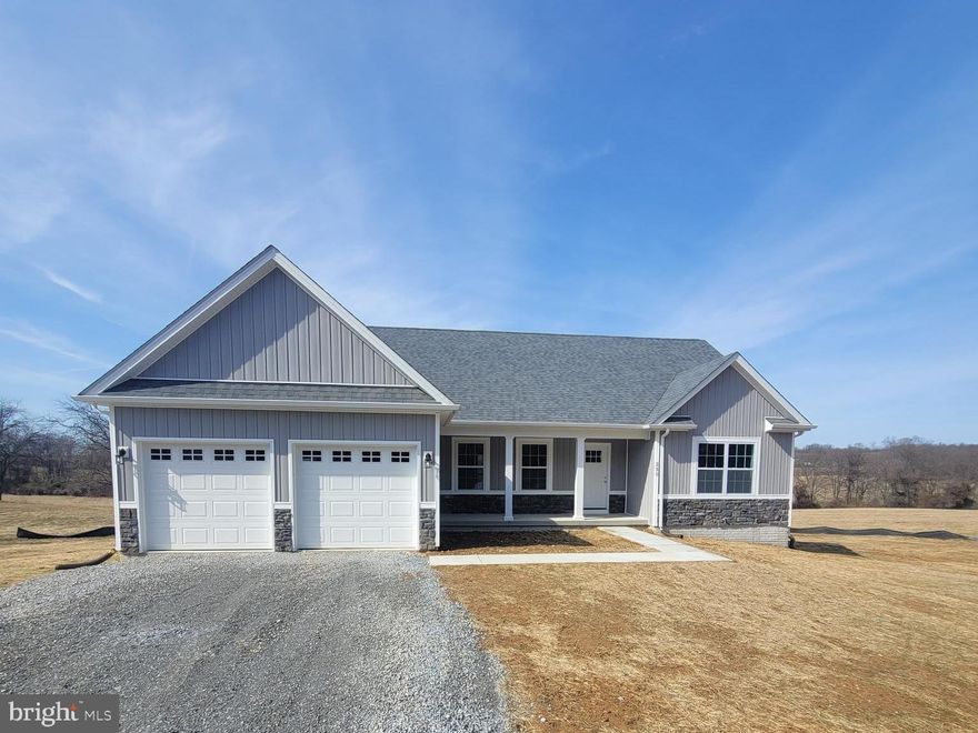 2024 delivery on this New ranch home on 10 acre lot. 1566 square foot Ranch style home boasts the sought after split bedroom design. The kitchen/dining combo is open to the expansive great room and features vaulted ceilings. Granite, ceramic, luxury vinyl plank flooring, carpet and stainless steel appliance package. Primary bath has a separate shower and soaking tub. Home is larger than it looks providing maximum usage of interior space. The front porch is great for evenings relaxing in a country setting that is close to amenities. Buyer pays transfer tax stamps. Measurements are approximate. The pictures will be similar to your new home with most finishes selected by the builder. Including upgraded white cabinets, Bianco Diamante  or Luna Pearl granite & stainless steel kitchen appliances.  Horses and chickens are allowed.