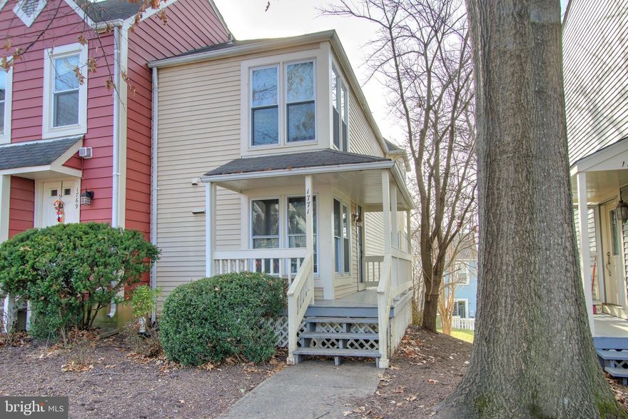 Prepare to fall in love with this absolutely adorable Victorian style townhome in North Reston! Beautifully maintained with a primary bedroom with walk-in closet and full bath upstairs,  plus an additional second bedroom with walk-in closet.  Downstairs, you'll find another large bedroom with walk-in closet and full bath and small kitchenette.  The sliding door opens to a beautiful covered brick entertainment area.   A separate laundry room with full size washer and dryer is on the lower level as well. The main level offers a beautiful remodeled kitchen with stainless steel appliances and Quartz counter tops, plus a spacious living room with a wood burning fireplace and dining area. There's also a powder room. Step outside from the living room to the fantastic deck with an amazing view! Enjoy this location with great outdoor amenities, close to commuter routes and minutes to Reston Town Center and the Reston Metro station.  Walk through this home right now by clicking the Tours link to access the 3D Matterport tour! OPEN Saturday from 11 am to 1 pm and Sunday from 1 pm to 3 pm.  Welcome Home!