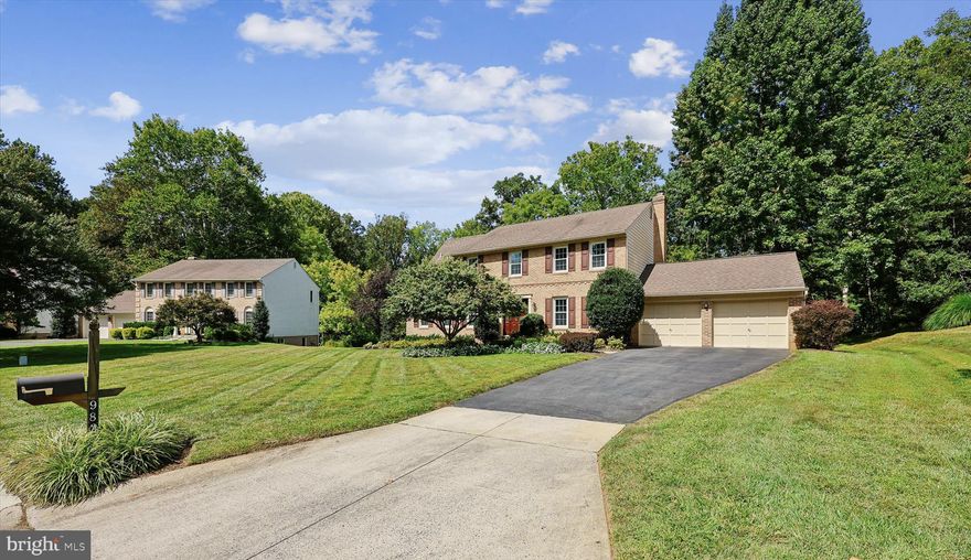 Unparalleled Four-Season Views of Private Creek and Parkland

Nestled on a quiet cul-de-sac in the highly sought-after Bedfordshire community, this
exceptional 4-bedroom, 3.5-bath Colonial with professional landscaping and beautiful curb appeal
is a rare gem, featuring a warm southern exposure and picturesque views year-round. Backing to a serene creek and lush parkland, this home combines breathtaking natural charm with modern updates. Recent
improvements include a brand-new roof (2025) with a 50-year transferable warranty (covering all new shingles, plywood, and decking for both the main house and gazebo), easy-clean tilt-in double-pane windows, a beautiful table-space kitchen with stainless steel appliances, new water heater (2024), newer A/C (2022), and furnace (2020). 

The welcoming foyer opens to a private office with French doors, hardwood floors throughout the main and second levels, and recessed lights.   A sunken living room with triple front windows flows gracefully into the formal dining room, accented by crown molding, chair rail, wainscoting, and a bay
window overlooking the scenic landscape.    A chef's delight, the kitchen features rich wood cabinetry, granite countertops, a deep sink, decorative backsplash, double-door pantry, broom closet,
and stainless GE appliances, including a double wall oven (one convection) and a new microwave (2023).

Adjacent to the kitchen, the family room centers around a wood-burning fireplace and
opens directly to the private deck and gazebo — perfect for al fresco dining surrounded
by panoramic views of the creek and parkland. The main level also includes a powder
room, laundry/mudroom with LG front-loading washer and dryer, utility sink, and direct
deck access, plus a two-car garage with attic access and dual openers.
Upstairs, the sun-filled primary suite offers a peaceful retreat with beautiful views
overlooking the creek. Enjoy a spa-inspired bath with a large walk-in shower with built-in
seat and hand wand, jetted soaking tub, double vanity with center dressing area, and
mirrored cabinets. The suite also includes a spacious walk-in closet and convenient attic
with access for storage or possible expansion. Three additional bedrooms each feature
double-door closets, with some including ceiling fans. The hall bath boasts a granite
double vanity, linen closet, and separate water closet. A cozy reading nook in the upper
hallway overlooks the front yard, while a double-door linen closet adds extra convenience.

The fully finished lower level offers exceptional flexibility for recreation, work, or hobbies.
A spacious recreation room includes mirrored walls for a dance or fitness area, three
double-door closets, and recessed lighting. A separate finished room with a closet can
serve as a home office, studio, or craft space. Completing this level are a full bath, large
utility closet, and abundant storage.  

Surrounded by natural beauty yet just moments from shops and restaurants of Potomac
Village, Cabin John, Park Potomac as well as I-270 and major
commuter routes, this sophisticated Gem in Potomac perfectly balances
tranquility and convenience. The Bedfordshire community is cherished for its tree-lined
streets, peaceful setting, and welcoming spirit. Don’t miss the chance to experience this
exceptional home in person!