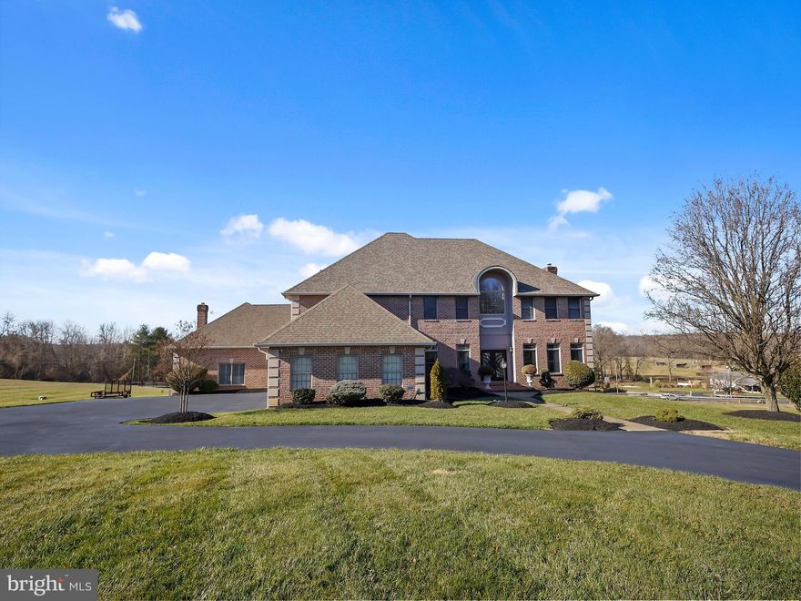 RECENT PRICE REDUCTION -  PLUS BUYER'S AGENT $2,000 BONUS.
PROPERTY SHOWINGS ARE BY APPOINTMENT ONLY.  SHOW TO PRE-QUALIFIED BUYERS ONLY.  

Welcome to this magnificent home nestled within the confines of a prestigious Friendship Estates neighborhood, this 9,470-square-foot; five level colonial home stands as a timeless testament to architectural grandeur and luxurious living. Majestic columns frame the entrance, leading into a grand foyer setting the tone for opulence.

The kitchen is equipped with state-of-the-art appliances and granite countertops, marble flooring serves as the heart of the home, inviting culinary indulgence, a masterpiece of architectural custom design, brilliance and opulent living; elegant hardwood floors guide you through the meticulously designed living spaces, where expansive windows bathe each room in natural light, accentuating the meticulous craftsmanship that defines every corner.  Situated in a sought-after prestigious neighborhood, this residence combines classic sophistication with modern amenities for the ultimate in luxury living.
Key Features:
Grand Entryway:
A sweeping staircase leads to the impressive main entrance adorned with  custom iron double doors, setting the tone for the grandeur within.
Spacious Living Areas:
Expansive living and entertainment spaces on each level, featuring high ceilings, exquisite detailing, and large windows bathing the interiors in natural light.
Gourmet Kitchen:
State-of-the-art chef's kitchen equipped with top-tier appliances, granite countertops,
Master Suite:
A lavish master suite occupying an entire level, complete with a private balcony, walk-in closets, and a spa-like en-suite bathroom.  The master suite is a sanctuary of tranquility, featuring a private balcony; a spa-like ensuite bathroom, and two sprawling walk-in closets.
Theater Room:
A dedicated  theater/entertainment room with audio-visual technology for an immersive cinematic speakers experience.
Additional Kitchenette in Basement - Additional rooms can flex to den/bedroom with basement entrance.
Outdoor Gazebo with HotTub:
Enjoy year-round relaxation with an covered HotTub featuring direct access to a private outdoor patio.
Fitness Center:
Stay fit in style with a fully equipped gym, offering mirrored views and inspiring spaces for workouts.
Smart Home Technology:
Integrated smart home thermostat systems for effortless control of heating and air-conditioning.
Outdoor Oasis:
Patio with outdoor kitchen overlooking manicured  yard, providing outdoor spaces for relaxation and entertaining.
Security and Privacy:
State-of-the-art security system, with cameras ensuring peace of mind for maximum privacy.
Garage Space:
Ample 3-car garage space for multiple vehicles (oversized spacing), with additional parking options available.

This exceptional custom colonial offers an unparalleled combination of luxury, comfort, and style. Whether you seek refined entertaining spaces, relaxation in the hot tub, or the convenience of comfortable home living, this residence fulfills the highest expectations of modern living. Experience the epitome of elegance in every corner of this 5-level masterpiece.

 Additional bedrooms boast their own en-suite bathrooms; and a Jack and Jill Bathroom ensuring comfort and privacy for all.

Entertainment finds its zenith in the home's lower level, where a fully equipped theater/entertainment room and stylish bar await another totally separate entertainment room. The outdoor oasis beckons with a sprawling patio, and lush landscaping, creating an ideal backdrop for soirées and gatherings.

With its classical exterior and modern interiors, this colonial masterpiece seamlessly blends timeless elegance with contemporary comfort, providing a haven of sophistication in the heart of a coveted neighborhood.