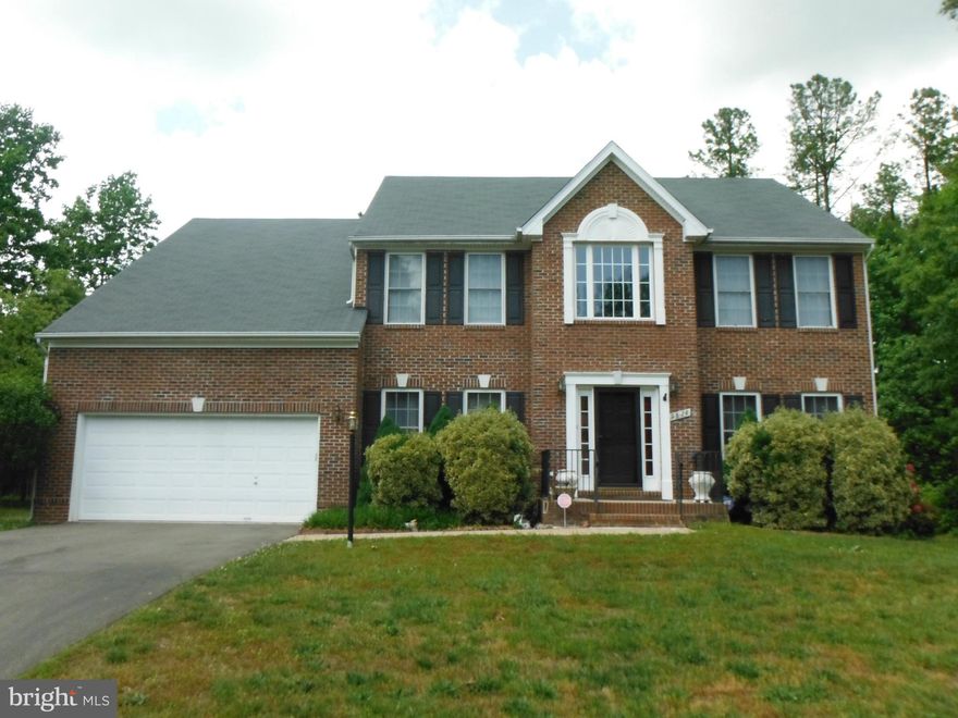 BEAUTIFUL brick front colonial features LOVELY cherry hardwood floors on entry floor, w/w carpet upper & basement levels.  SPACIOUS master with HUGE walk in closet &2 sided fireplace, spa bath w/jetted tub, sep. shower. Extra room (NTC) and full bathroom in basement.  Large deck & 2 car garage.  In sought after Fox Point.  Close to 95, commuter lot, school & much more! No pets allowed.