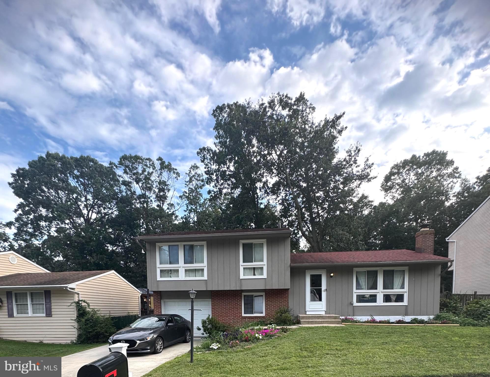 Welcome home to this beautifully updated single family home in Glen Burnie. This well maintained split level offers tons of natural lighting. Walk into this inviting large foyer with high ceilings and newly installed luxury vinyl floors. In the kitchen you will find a gas range, built in microwave marble countertops & plenty of counter & cabinet space. As you step into the dining room you can look out into the large fenced in backyard with a deck & playground in the living room you can relax by the fireplace in the evening. As you venture to the lower level of the home you will find a den with exposed brick, a family room, access to the garage the fourth bedroom and plenty of storage space. Upstairs boasts a full bathroom, linen closet, two additional bedrooms and the primary suite. Parking is stress free as this home offers a garage, driveway & street parking. This beautiful oasis will not last long, schedule your showing & move in before the summer ends to enjoy all this home has to offer. Pets are welcome on a case by case basis.