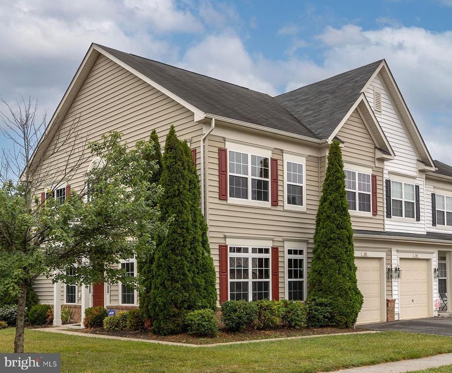 Absolutely the best END UNIT in Wakeland Manor.  Lots of green space (grass) outside the front door.
RING doorbell conveys, NEST thermostat conveys, all 23 WINDOWS have CUSTOM BLINDS (you do the math..), LUXURY VINYL PLANK and TILED FLOORS. The CLOSETS are all CUSTOM equipped with METAL SHELVES and DRAWERS (see pictures).  TILE BACKSPLASH in Kitchen,  an oversized PATIO AWNING  with remote($3,000.00+ estimated value) - speaking of the PATIO, all STAMPED CONCRETE surrounded by PROFESSIONALLY LANDSCAPED grounds- and  a quality PRIVACY FENCE with rear gate access.    Corner FIREPLACE and an elongated and insulated/drywalled 1 CAR garage with enough room for your push mower etc. Good overflow storage as well for smaller household things and boxes to the rear of first floor closet. ALL in ALL, this unit is truly on top of the list in this very safe and centrally located neighborhood.  It is spotless and 100% ready for occupancy.   Washer and Dryer included (as -is), works great.  New GAS Waterheater 2020, GAS Cooktop.
