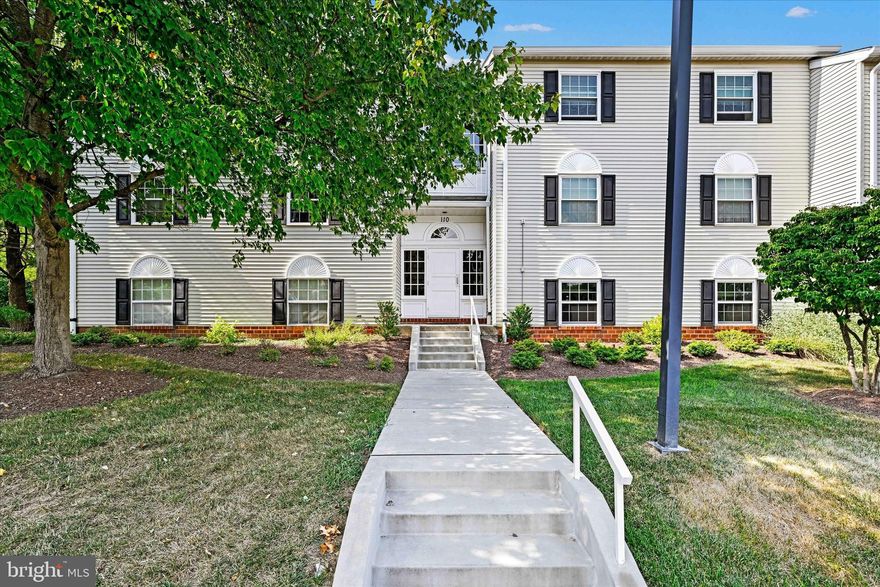 Mays Chapel 3rd level wood-facing condo is now available! This 2-bedroom, 2-full bathroom condo has hardwood floors throughout, updated primary bathroom and large laundry/storage room off the kitchen. Partial wall/island between kitchen and dining room for more of an open floor plan. Enjoy the peace and quiet on your balcony as it faces the wood-side not parking lot! Hot water heater and washer and dryer replaced 2019. Building just received a new roof.  Charming court and location in Mays Chapel, come see it today! Sold as-is