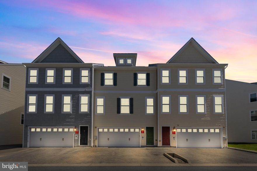 12907 Sandbar Lane Unit 2 is a beautifully appointed townhome located in the sought-after Seaside Village community of West Ocean City, Maryland. Deeded boat slip #43 comes with this unit including a lift.  Built in 2015, this 2,135-square-foot residence offers a perfect blend of coastal charm and modern amenities, making it an ideal choice for both year-round living and/or lucrative weekly rentals. From the back deck, residents can relish panoramic views of the Assawoman Bay and the Ocean City skyline. The waterfront setting provides a serene backdrop for morning coffees and evening sunsets. Additionally, the vantage point offers a front-row seat to Ocean City’s fireworks displays and the annual Air Show.   First floor can be used as a 4th bedroom with ensuite, or an additional family room.  Take advantage of this unit and the lowest price on the bayfront.