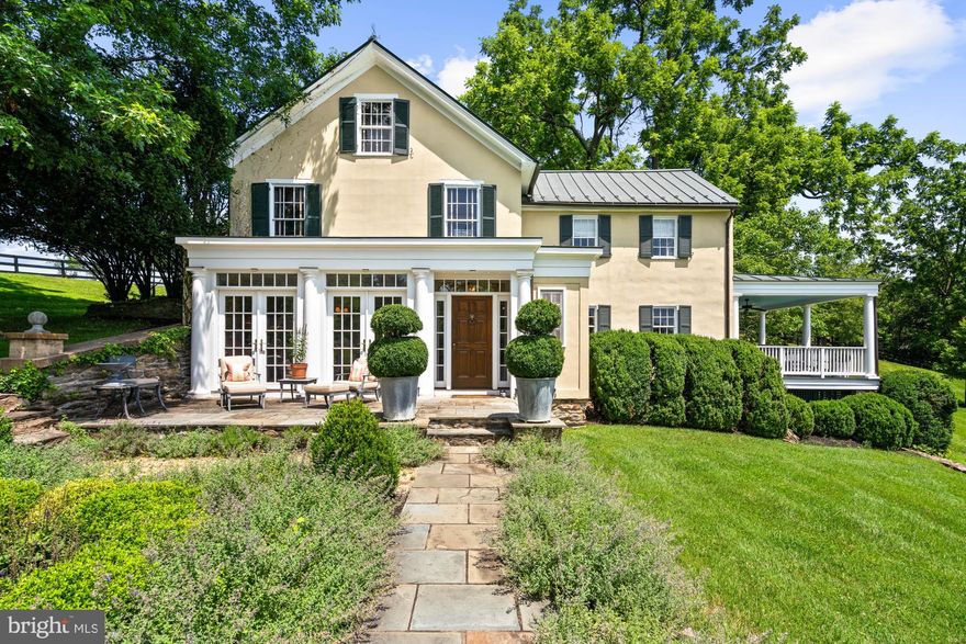 For the first time in nearly 30 years, Boxwood Glen, a distinguished country estate dating to 1870 in the heart of Virginia Hunt Country, is offered fully furnished and turnkey.

Gracefully evolved over time, the residence reflects a thoughtful balance of heritage and refinement. A newly designed marble kitchen anchors the home, while four bedrooms, stone fireplaces, and a series of terraces open to sweeping, private views, creating a setting equally suited for intimate living and elegant entertaining.

A tree lined drive reveals a pea gravel motor court and a separate 12 stall barn with rental potential, completing a property that is as functional as it is beautiful.

Location remains paramount. Just 10 minutes from Middleburg’s Main Street, Boxwood Glen is not merely a residence, but a rare retreat where history, landscape, and timeless design come together with quiet sophistication.