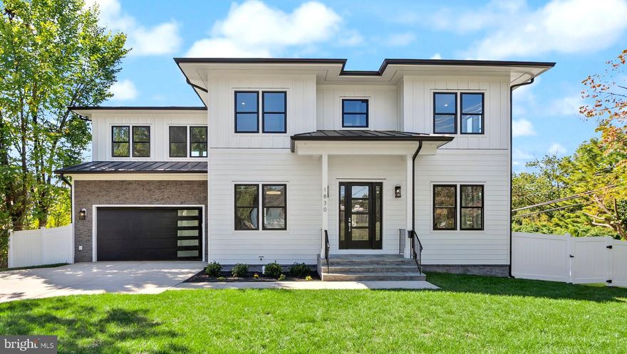 Discover this newly built contemporary residence in the desirable Pimmit Hills community, offering over 6,700 square feet of thoughtfully designed living space. Featuring 6 bedrooms and 6.5 bathrooms, this home blends modern elegance with everyday comfort. Step into a bright and inviting main level featuring soaring 10-foot ceilings and an open-concept design that highlights the gourmet chef’s kitchen. Equipped with GE Café appliances, custom cabinetry, a walk-in pantry, and a spacious island, the kitchen flows seamlessly into the sun-filled family room. A sleek linear fireplace serves as the centerpiece, while dual sliding glass doors extend the living space onto a composite deck for easy indoor-outdoor entertaining. Also on this level is a private bedroom with an en-suite bath and walk-in closet, offering versatility for main level living or a home office. The upper level showcases a luxurious primary suite, complete with two oversized walk-in closets and a spa-like bathroom featuring heated floors, soaking tub, and multi-head shower. Each of the three secondary bedrooms comes with its own private en-suite bath. For added convenience, a generous laundry room is also located on this level. The fully finished lower level features a spacious open layout with endless possibilities, easily converted into a recreation room, second living area, or a guest suite. A full bath and private entrance enhance the functionality and versatility of this space.
Located in Pimmit Hills, just minutes from Tysons and downtown McLean, this home offers convenient access to major routes including I-495, I-66, and the GW Memorial Parkway, as well as nearby public transit such as the Vienna/Fairfax–GMU Metro station on the Silver Line. Blending modern luxury with a prime location, this residence provides the ideal setting for comfortable and refined living!