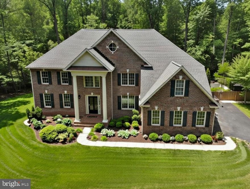 Welcome to this extraordinary custom-built estate offering over 6,000 finished square feet of refined living space, 5BR ,4.5 Baths, 3 car garage w/ custom storage, all conveniently located on a private 1.5-acre level lot backing to serene woods and mature trees. Thoughtfully and extensively remodeled within the past year, this home blends timeless elegance with today’s most sought-after upgrades.
At the heart of the home is a stunning, fully redesigned Chef’s kitchen featuring an expansive center island, premium stainless steel appliances, quartz countertops, and high-end custom cabinetry—designed to impress and built for everyday living. Newly refinished hardwood floors flow throughout the main level, enhancing the home’s warmth and sophistication.
The dramatic two-story family room showcases a floor-to-ceiling stone fireplace and walls of windows that flood the space with natural light. A spacious rear office with a distinctive picture window offers inspiring views of the backyard and visiting wildlife—perfect for working from home in tranquility.
Upstairs, the luxurious owner’s suite is a true retreat, complete with a newly remodeled spa-like bath and multiple walk-in closets. Three additional generously sized bedrooms feature beautifully updated Jack-and-Jill baths and one en-suite bath, offering comfort and style for family and guests alike.
The finished daylight walkout lower level is designed for entertaining and relaxation, offering a large game room, media/TV room, full bath, and opportunity for a fifth bedroom. An expansive unfinished storage area—with full-size windows—provides exceptional potential for future finished space. Step directly outside the full walkout to your private outdoor oasis. Enjoy your own resort-style retreat featuring an incredible in-ground custom saltwater Gunite pool with waterfall, extensive concrete decking, auto retractable pool cover, and an enormous elevated Trex deck overlooking the grounds—perfect for gatherings or peaceful evenings under the stars.
All this privacy, yet just minutes to premier shopping, dining, top-rated schools, and major commuter routes.
This is more than a home—it’s a rare opportunity to own a truly one-of-a-kind jewel. Do not miss out!