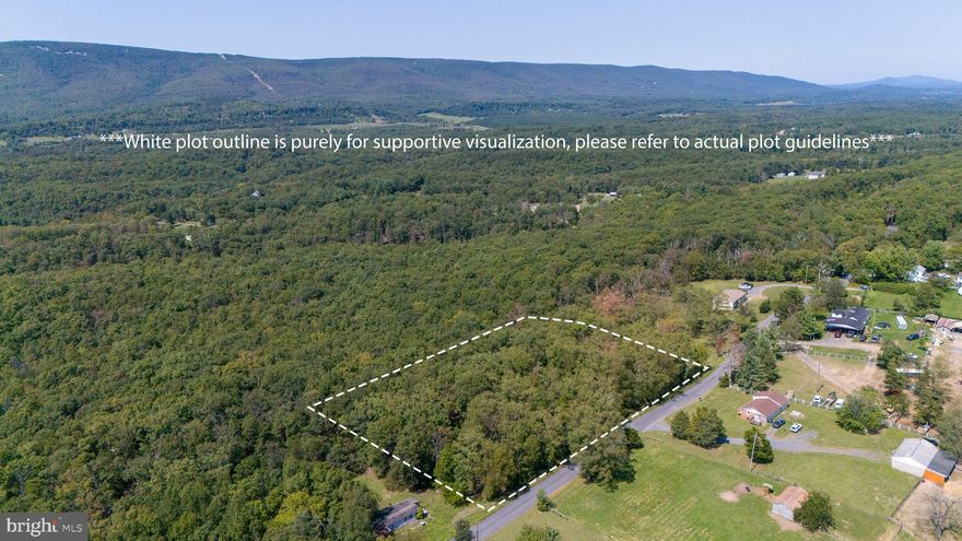 Buildable 1.83 Acre lot on Laurel Grove Rd.   Property has paved road frontage, approved septic cert and plat available.   No HOA,  lot is unrestricted.   Located approximately 15 mins  from Winchester Medical Center, restaurants, grocery stores and gas stations. Multiple offers received, please have offer /changes in by 1pm 9/9