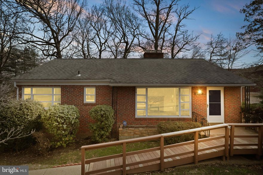 Location Location Location!  Walk to metro! Minutes to Tysons and Mosaic District.  This five bedroom two bath all brick ranch has two fireplaces with brick mantels.  Hardwood floors on main level.  Large screened rear porch.  This is a great opportunity to buy close in at a reasonable price and renovate to your taste.  Buildable lot is just over a quarter acre and flat, can add on or build to suit.  Property sold AS-IS