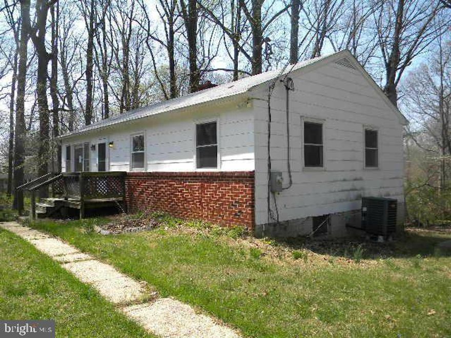 LOCATION! LOCATION!LOCATION!This 1 acre plus  lot is PERC tested and approved for a new house.  Located in front of the new Toll Brother/ Willow Creek Community selling at starting $1.2 Million. See attached PERC documents. Grading/SDP attached. The property is being sold completely AS-IS. OR  This 3 bed, 1 bath home is just waiting for custom renovation. A little TLC would go a long way. The unfinished basement allows potential for more living space & the property. No Electricity so bring  a flashlight.  Please follow all COVID guidelines! Wear mask and social distancing.