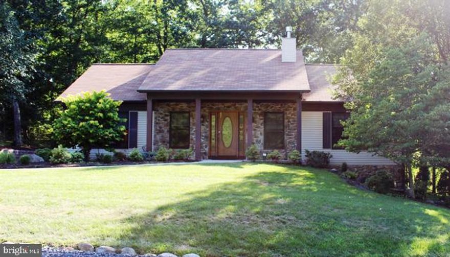 This 4 bedroom rancher is ready and waiting for you to make it your home.  Nestled among the trees of Lakewood, the space of this 2600+ sq. ft. home will pleasantly surprise you.  As you enter the living room through the front door, an open floor plan, cathedral ceiling and fireplace await.  The dining area is adjacent to an amazing, customized kitchen which features cherry cabinets and a corian counter top.  The laundry room is located on the main level off of the kitchen.  The master bedroom is spacious and features a large master bath with a soaking tub and a stand alone shower.   There are two bedrooms located on the opposite end of the main level which offer privacy for family or guests.   The basement has a large family room, a full bath and an additional bedroom.  The home is heated by propane on the main level as well as the basement and there is some electric baseboard heat for backup in the basement.  This home also features a side-entry, two car garage.  Imagine coming home after a long day of work, sitting on the screened porch and enjoying nature's beauty and a nicely landscaped yard.  Call today for an appointment and make 184 South Lakewood Drive your new home!