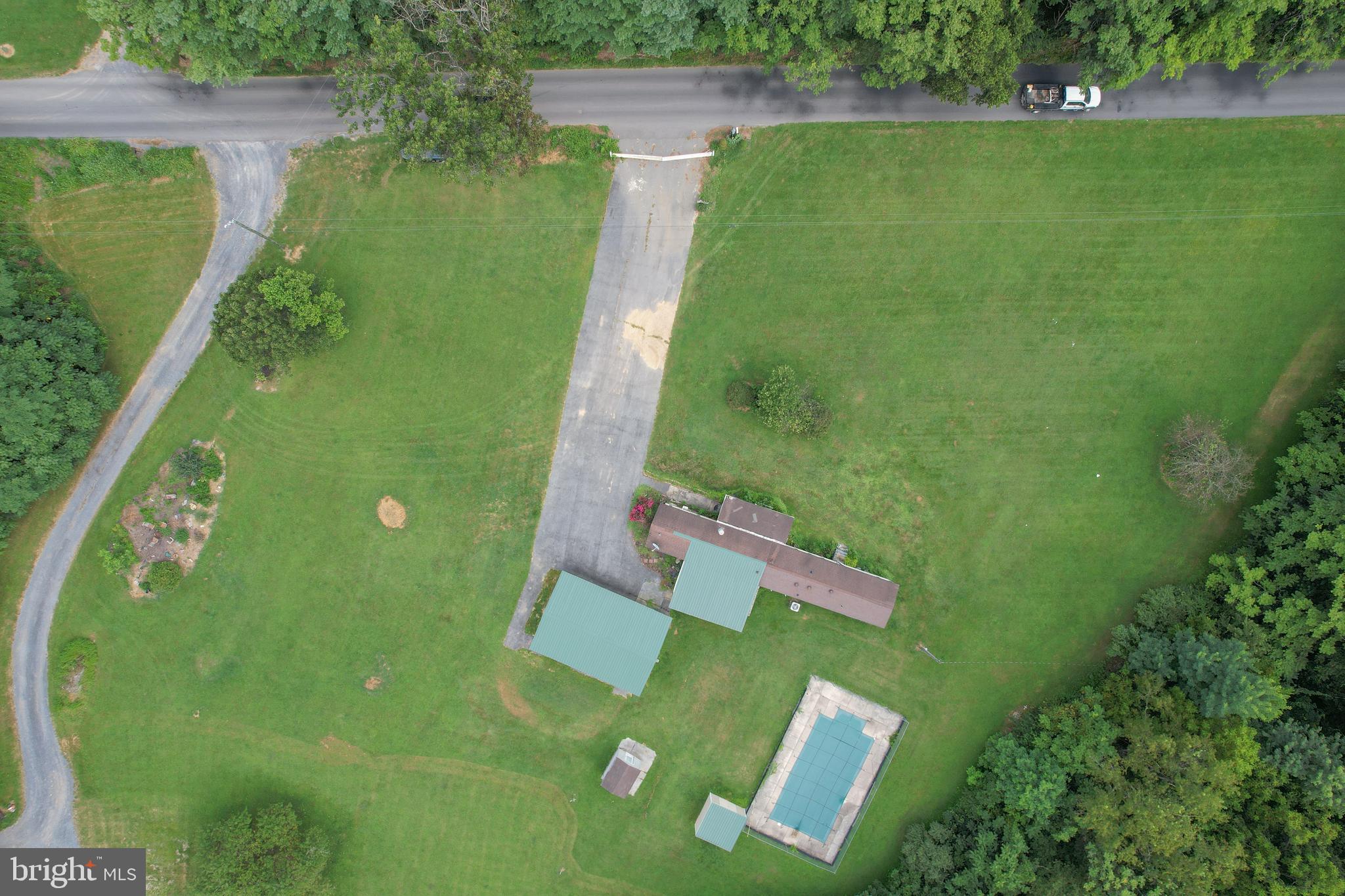 Beautiful and buildable lots on Welltown Road. Build your dream house and an extended family suite/ guest house. Build two, live in one, sell one! There are so many option on this unrestricted parcel. The mobile home on the property has electric, well and septic. The mobile home is not where the value is and is a tear down. The second parcel has been perc previously and is suitable for building. There is a split foyer home on an adjacent parcel who has an easement to use the second driveway. The pool area has not been used by current owner and is covered and fenced. Mature fruit trees surrounded by lush VA wildlife and thriving forest, you are going to want to make this little slice of privacy your next big move!