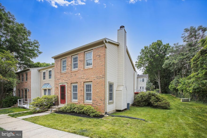 Meticulously maintained 3 level End townhome features beautiful refinished hardwood flooring and fresh paint throughout.  Elegantly remodeled eat-in kitchen with rich maple cabinetry, granite counters and stainless steel appliances.  Formal living room with fireplace and separate formal dining room with a French door to the deck.  The upper level has 2 large primary bedroom suites with tastefully remodeled bathrooms and walk-in closets.  The laundry room is on the bedroom level for added convenience.  You will love the huge lower level rec room with LVT flooring and recessed lighting.  There is also a large storage room and a walk-in closet that is roughed in for another bathroom.  The fenced back yard features a large deck with steps to the stone patio.  Recent upgrades include thermal replacement windows (2 years), new roof (3 years) and brand new carpet.  There is also a backup gas generator to ensure the home is never without power.    Conveniently located just inside the Beltway close to everything!