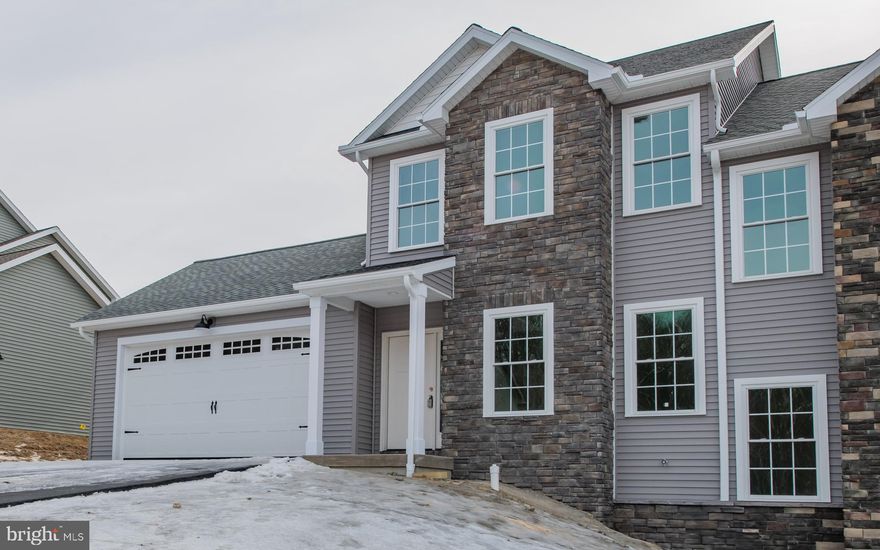 Woodland Heights is a new townhome community on a quiet cul de sac with beautiful views of mountains yet minutes from town. These custom built townhomes have over 1800 sq. feet of living space with teh possibility of finishing the lower level walk out basement for added square footage. Property features open concept living room, dining room and kitchen as well as a 1st floor primary bedroom and bath suite. Laundry room, mudroom and half bath also located on the main level. Two additional bedrooms and spacious bathroom are located on the second floor. Wonderful covered porches for dining alfresco or enjoying the outside. NOTE ALL PHOTOS ARE FROM PREVIOUSLY BUILT UNIT AND ARE REPRESENTATIVE OF WHAT IS CURRENTLY BEING BUILT.