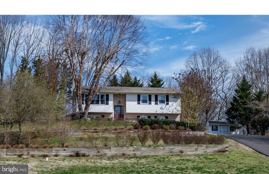 Nicely Updated Home in Hardesty Estates!  Enjoy the Peace and Serenity of Nature on this 1+ Acre Lot with Outstanding Views.   This Updated Home has Hardwood Floors on Main Level.  Four Bedrooms and Three Full Baths.  Light-Filled Kitchen with Stainless Steel Appliances, Breakfast Bar and Plenty of Cabinets.  Large Living Room and Separate Dining Room with Wainscoting and Slider to Covered Deck.  Spacious Master Bedroom and Master Bath on Main Level with Two Additional Bedrooms and Hall Bath.  Lower Level has Large Family Room with Fireplace, Bedroom, Full Bath, Laundry Room and Storage.  Top Rated Schools Easy Access to Annapolis, Washington DC and Baltimore.