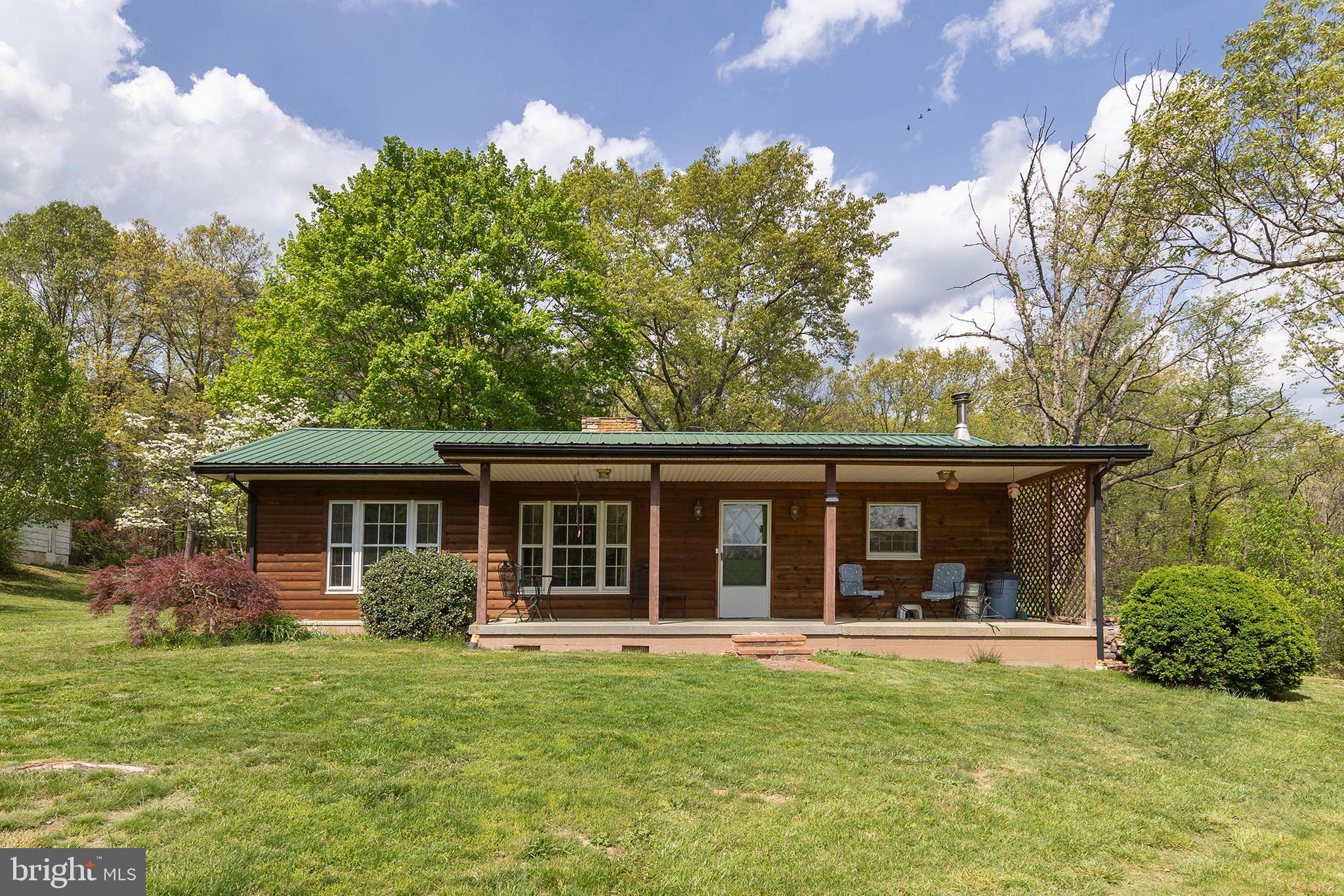 Motivated Seller! Bring offers!
Discover peace and privacy with this charming farmette tucked away on 25.877 unrestricted acres. The property offers a perfect blend of 10 acres of lush pasture and 15 acres of serene wooded land, with approximately 20 acres already fenced — ideal for animals, agriculture, or simply enjoying wide-open space. A barn adds both function and character, ready for livestock, equipment, or hobbies.
Enjoy the added beauty and utility of a stocked pond and a babbling stream that runs through the property, creating a truly picturesque setting.
The cozy home features built-in bookcases, a freshly stained exterior, a brand-new metal roof, updated electric, and a freshly painted interior. City water has been connected for added convenience, eliminating the need for a well. A new washer and dryer are also included.
Take in stunning views from the full-length front porch, ideal for peaceful mornings and relaxing evenings. A full basement offers plenty of storage options, and the secluded setting ensures unmatched privacy—your own private retreat just waiting to be enjoyed.
Conveniently located near Romney, WV, you'll have easy access to shopping, dining, and other amenities while still enjoying the quiet and peaceful surroundings of the countryside.
Please note: No drive-bys. All showings must be scheduled and accompanied by an agent.