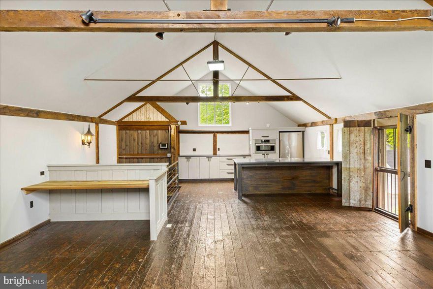 Trendy refurbished barn in Doylestown Borough, walking distance to well ....everything.  Shopping, dining, transportation and parks.  Private parking plus one car attached garage.  This two bedroom one and a half bathroom has a full size washer and dryer in house as well.  This one of a kind custom home is a must see.  From rustic barn wood wide plank red oak flooring to exposed beams and vaulted ceilings.  The large kitchen is boasting with Bosch electric appliances walk in pantry and large seating area around kitchen island.
This is a must see.