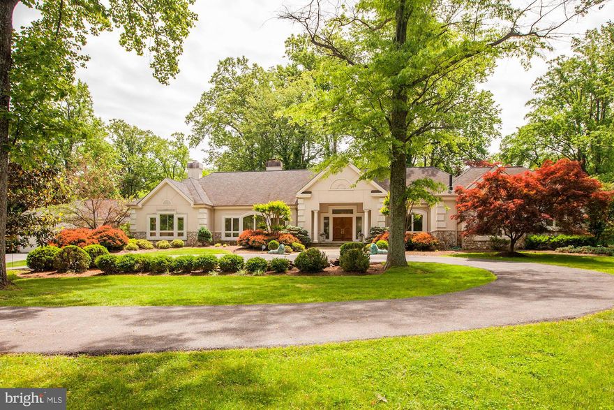 Serious Sellers are relocating.  Here's your opportunity to live on the "Gold Coast" of Potomac, south of River Road and inside Potomac Village...Exclusive, 5,500+ SF estate on spectacular 2+ acre  setting close to Potomac Village and on a very private, quiet enclave off Persimmon Tree Rd.  Complete custom rebuild/renovation/expansion of the original home in 2001.  Exceptional, custom designed home with expansive entertaining spaces,  large picture windows overlooking this pristine setting in prestigious Bradley Farms.  High ceilings, open spaces, it feels and lives like a gorgeous Florida home.  Let the sun shine in!  Beautifully finished with custom built-ins, a hand crafted stone fireplace, a Chef's kitchen, a main level library, a main level master suite, an apartment above the garage and an au pair suite in the Lower Level.  Fabulous outdoor entertaining terraces plus a tennis court (sold "as is").  Note: prior pool was removed.  Ask for details.        Enjoy this breath of fresh air!  A rarely available opportunity waiting for you!