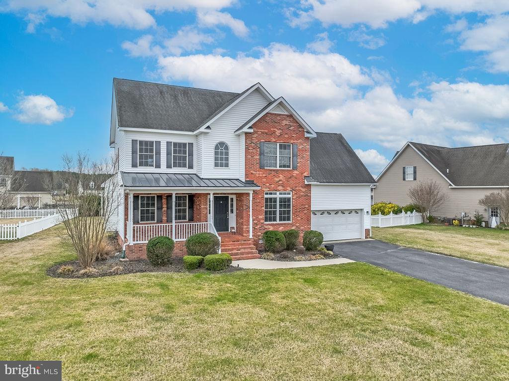 This beautiful four-bedroom, two-and-a-half-bath home sits on a spacious, cleared lot. As you approach the charming brick-front exterior, you'll be welcomed by a large porch, ideal for relaxation. Step inside to a stunning entryway, where you'll immediately be captivated by the elegant two-story hardwood staircase.
The main level features a formal dining room, a versatile flex room, a spacious family room with a cozy pellet stove, and a bright eat-in kitchen. The kitchen boasts a bay window that overlooks the meticulously maintained backyard. A newly added, low-maintenance deck offers the perfect spot to unwind outdoors.
Upstairs, you'll find the luxurious master suite, complete with a private bath featuring a separate jetted tub and a walk-in shower with custom tilework. The master suite also includes a generously sized walk-in closet for ample storage. Two additional large bedrooms are on this level, one of which offers private access to the second full bath. The fourth bedroom is large enough to serve as a bonus room or second living space, providing endless possibilities. For additional storage, the floored attic spans the entire length of the home’s top floor, offering plenty of room to keep your belongings organized and out of sight. The neighborhood is conveniently located at the south end of town in close proximity to the University, Hospital, shopping, restaurants and the Bypass. Make your appointment today to see this one of a kind home!