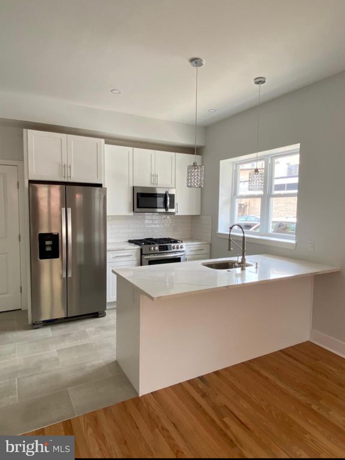 Move right into this newly beautiful bi level 2 bedroom 1.5 bath apartment. This property has hardwood floors throughout, quartz countertops, washer / dryer, and much more. This property is in the heart of Passyunk Square and steps from all the wonderful restaurants / shops. Subway and bus lines close walk. Make your appointment now this will not last long!!
