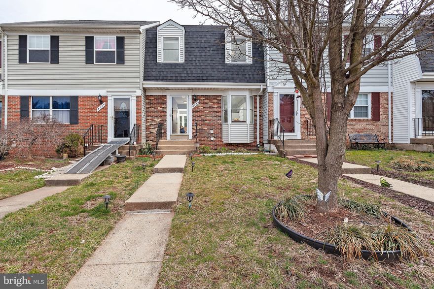 Don't miss this opportunity, beautiful moving ready 3 levels TH with a lot of upgrades: Roof    2016, windows 2017, kitchen cabinets, countertops and appliances 2016, deck and sliding door 2017, water heather 2017. Basement has a full bathroom, entertrainment area  and a den that can be use as a 4th bedroom.  Two assigned parking spaces right in front of the town house, very low HOA fee.