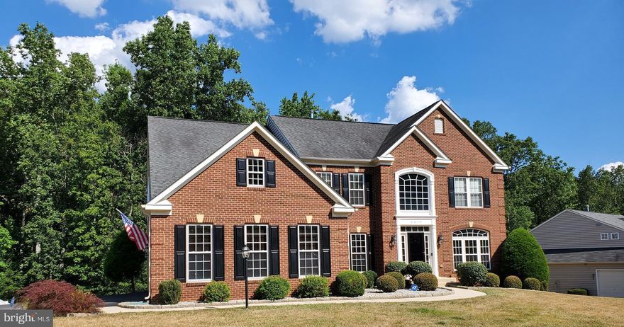 RARE offering of this stunning home with custom upgrades and over 6000 finished sq ft in Broad Creek Estates!  Built in 2008, meet the Highgrove model from Ryan Homes with bump-outs in the kitchen, sunroom, morning room, master bedroom and basement. Meticulously maintained and elegant, this home will not disappoint! Features open floor plan with separate formal living and dining areas, hardwood floors, gourmet kitchen with huge island, stainless steel appliances, granite coutertops, butler's pantry with sink and large family room with fireplace.  Upstairs you will find 4 bedrooms, including a well-appointed master suite with his and her walk-in closets, sitting area and master bath with separate  dual head shower and soaking tub. Additional upstairs bedroom features a private bath and the other two upstairs bedrooms share a jack-and-jill bath. The basement is an entertainer's dream and includes a bar, second family room/rec room with gorgeous custom tile and gas fireplace, 5th bedroom/office with closet (not to code), full bath, theater room and gym with sauna. SMART HOME features to convey include Ring doorbell, Nest thermostat, alarm/survelliance system with 3 indoor and  2 outdoor cameras, two floodlights on the back of the home and 3 glass break sensors. Also to convey with this fabulous home: surround sound, 6 TVs (located in all 4 upstairs bedrooms, basement family room and gym),  sauna, pool table, small fridge in bar area and window treatments. Attached 3-car side-load garage and ample room for parking in the driveway for all your friends and family. Professional landscaping in the front and a large maintenance-free deck complete this picture of perfection. Home backs to trees for added privacy.  See documents for similar floor plan (floor plan is in reverse and does not show the bumpouts). This home is AMAZING! ***Showings limited to 3 adults per showing (agent plus no more than 2 buyers). Please follow the COVID-19 PRECAUTIONS: Remove shoes or wear shoe covers, wear a mask and wear gloves while viewing home.***