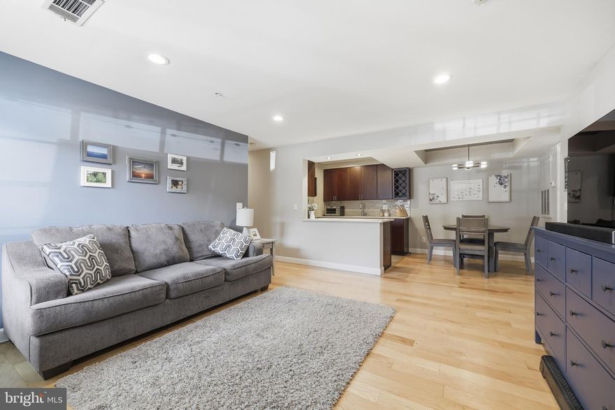 This is it!  Fully updated one bedroom and one bath condominium in The Gables of Tuckerman,  Enter the main level condo from the outdoor patio and enjoy this fully updated home.  The kitchen has been opened up to include quartz countertops, high end cabinets, wine rack, stainless steel appliances, and washer and dryer.  The dining area is just off of the kitchen.  The living area has a generous amount of space and two large closets.  The bedroom is separated by a hallway and is large enough to be furnished with a queen size bed, dressers and desk.  The walk-in closet has been updated with a built in organizing system that includes shelving.  On the opposite of the hall is the updated bathroom that features a large tiled walk-in shower with seat, sink, toilet and linen closet.  Freshly painted.   Engineered hardwoods throughout.  The Gales of Tuckerman is conveniently located off of Tuckerman Lane between Rockville Pike and Old Georgetown Rd and includes a fitness center, walking trails, tennis courts and pools.  The home is conveniently located near two grocery stores including The Grosvenor Market and Balducci's Market.  Shopping and restaurants are located at Wildwood Shopping Center. Walking distance to Bus and Grosvenor Metro.  Don't miss this great opportunity to own your own home!