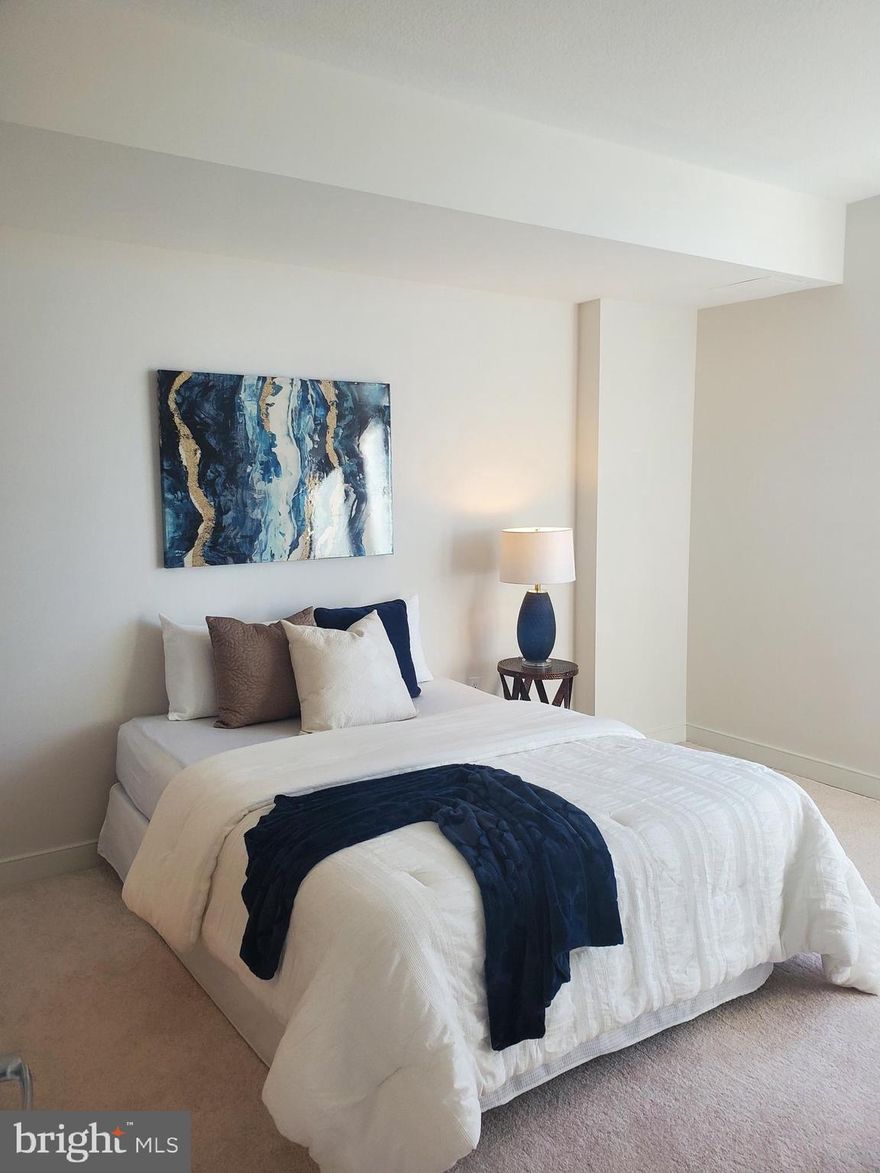 WATER VIEW!!   On the Poolside of the building.  New Price $315,000

Gorgeous 1 BR/1 Bath condo at One National Harbor with a water view from the living room.  Walk into this premium building that has phenomenal water views. This beautiful condo has  new light fixtures. There are hardwood floors, granite countertops, stainless steel appliances, fantastic lighting , washer and dryer in the unit and a large walk-in closet. It comes with a full-size parking space in close proximity to the elevator . The building offers concierge service and onsite property management . Enjoy the fitness center and community room with a terrace facing the Capitol Wheel and Potomac River. Go up to the rooftop pool for a quick swim in the sun and relax on the rooftop observatory deck that overlooks the Potomac River, DC, Old Town, Alexandria . Don't forget the Bike paths for your daily exercise. Located not too far from National Airport, Andrews and Bolling Air Force Base. Take advantage of the views you can only dream of. Welcome home!