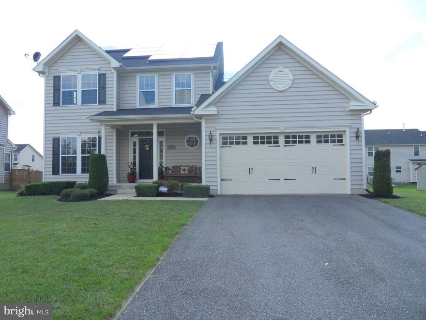 SHOWS LIKE A MODEL! Immaculate Colonial with open floor plan. Kitchen with large center island and morning room & separate dining room. Entertain in the formal living room or family room off kitchen. Retreat to  the master suite with luxury bath..soak tub, separate shower, double vanities, walk in closets. Relax on the cozy front porch. This home will sell itself...just open the door!!