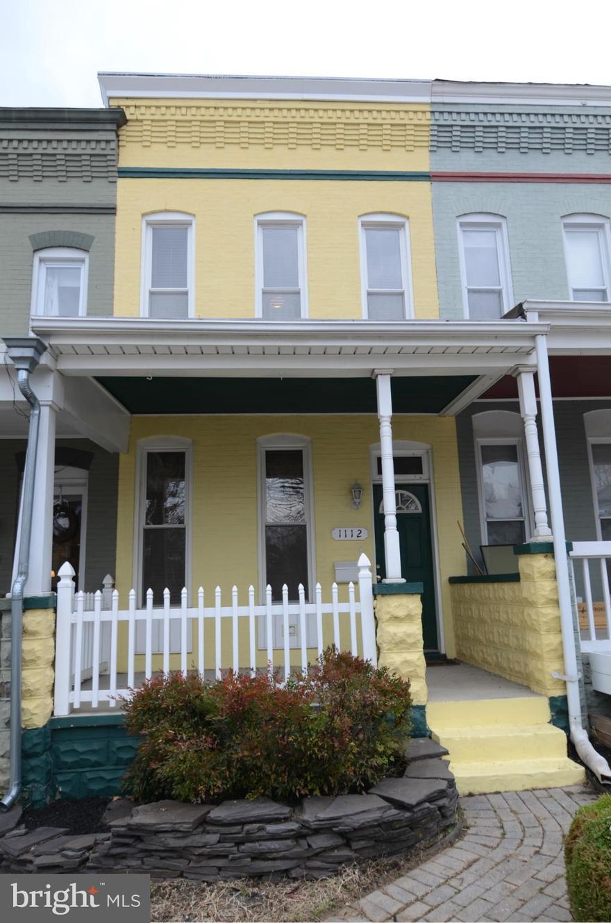 Fully renovated Hampden porchfront - 2 blks to The Avenue! 2 master bedrooms w/baths on second floor. Large walk-in closet with built-ins.  9 foot ceilings. Wood floors throughout. Large kitchen with granite and stainless. Great location on quiet one-way street - usually very easy parking in front. Fenced brick courtyard/yard. Live the life, hon!