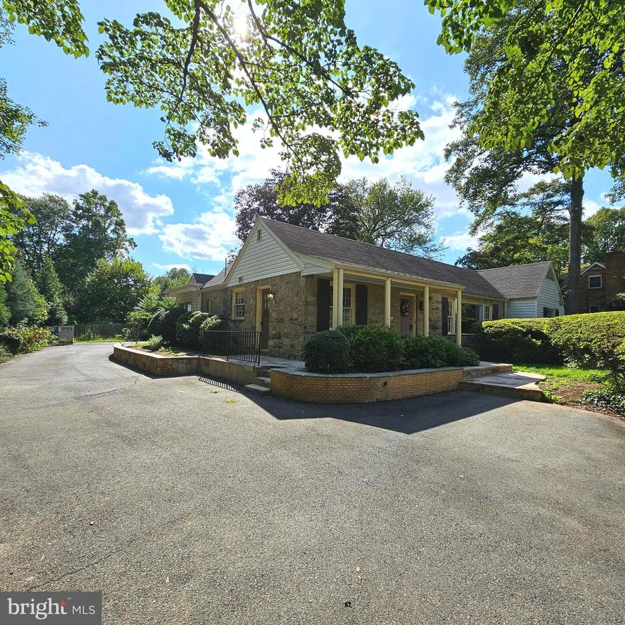 This charming stone-front 3-bedroom cottage with bonus room will welcome you into the peaceful oasis of Sleepy Hollow, a park-like neighborhood of old-growth trees and large lots, with easy access to Rt 50 and the Beltway, only 8 miles from the DC line.  
  The main home features hardwood floors throughout, 2.5 baths (including a brand-new master bath), an updated kitchen, a den with built-in bookshelves, and a sunroom.  Across the shaded flagstone patio is a spacious two-car garage.  And above the garage, you'll find the perfect place to work or relax in privacy: a bright, serene carpeted room with its own entrance and (brand new) full bath with rain showerhead.  
  There's plenty of room for entertaining outdoors in the almost half-acre lot, and foragers of all ages will enjoy harvesting a snack from the fruiting plants, including a sour cherry, blueberries, red currants, raspberries, plum tree and fig tree.  The gracious driveway is bordered by a curving stone wall with embedded exterior lighting and lined with dogwoods, a lilac, and a lane of hydrangeas.
  The Sleepy Hollow neighborhood includes an active neighborhood watch program with up to 2 drive-throughs per day and a community association that sponsors several neighborhood events, including a fall and spring picnic, catered wine tasting evening, Halloween costume parade with band, and other events.  A neighborhood list serv connects the community and provides assistance and advice.  If you are looking to easily establish roots in the DC area, the Sleepy Hollow community will impress you.  
  Include yard care for an additional $200/month.  No smoking.  Dogs with prior approval (NO CATS).  Maximum 2 unrelated adults.  Application fee of $65.95 and earnest money deposit check(s) made payable to Promax Management, Inc.