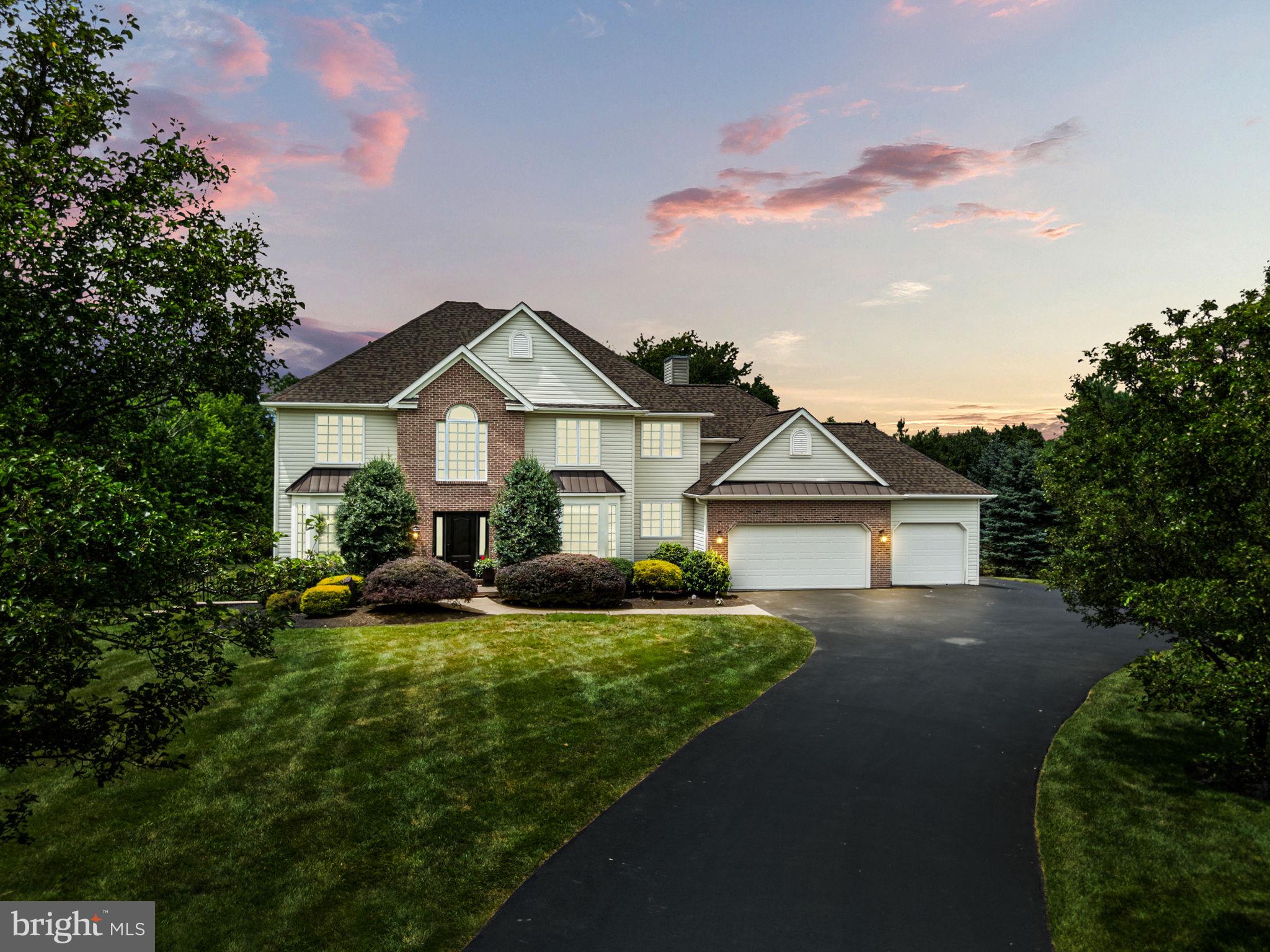 Tucked away on a private 1.3-acre lot in the heart of Worcester Township, this tailored beauty has everything you need to host unforgettable gatherings or simply relax in your own resort-like oasis.
Imagine endless summer days on the patio by your heated pool, evenings under the custom gazebo, and cozy nights in the hot tub. This home is designed for making memories inside and out.
Step into the sunlit two-story foyer and feel the grand welcome. Off the entry, you'll find a private office and a formal dining room perfect for holiday dinners. Continue into the heart of the home, a stunning open kitchen with 42" cabinetry, granite countertops, tiled backsplash, center island, double oven, and stainless-steel appliances, a true dream for any gourmet chef. The adjacent breakfast room is flooded with natural light and flows effortlessly into the family room where a gas fireplace and expansive doors open onto the sprawling deck. On this level, the TimberTech deck, wired with lighting throughout, offers three inviting seating areas, one beneath a beautifully designed gazebo and another high-top space with views of the pool. Gated stairs lead directly down to the pool, adding both convenience and peace of mind.
Upstairs, the primary suite is your private retreat with a sitting room/office and a spa-like bath featuring a Jacuzzi tub, a luxurious 4-head shower and an adjoining walk-in closet. Three additional spacious bedrooms, a full hall bath, and a large linen closet complete the second floor.
The finished lower level elevates entertaining with a sophisticated wet bar topped in granite, a spacious recreation area anchored by a gas fireplace, a private exercise room, and a full bath. A versatile bonus room provides the ideal setting for a home office, craft studio, or elegant storage solution.
And when it's time to move the party outdoors? The basement walks right out to the expansive hardscaped patio, private heated pool and covered hot tub area that will have your guests coming back again and again!
Other perks: oversized 3-car garage, 2-zone HVAC, automated pool system with WiFi and even a holiday light package to make decorating a breeze. All of this in the award-winning Methacton School District.
This home isn't just a place to live, it's a lifestyle. Are you ready to fall in love?
Don't forget to check out the walk-through video under virtual tour.