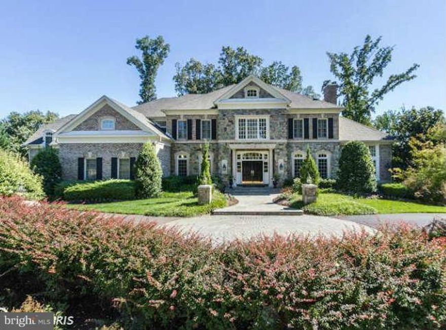 Exceptional brick & stone residence located in the highly sought after Reserve. This former model home is perfect for family living or grand entertaining, luxury abounds throughout.   Featuring open & sun-bathed public rooms, wonderful Family Room, Gourmet Kitchen, Conservatory, & Master Suite.   6 Bedrooms, 6 Full & 3 Half Baths. 4-car garage plus bonus room with bar & half bath above garage.