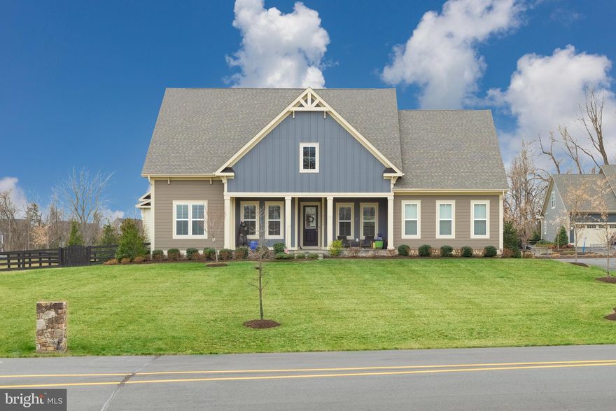 Welcome to your maintenance free lifestyle in the prestigious neighborhood of the Grant in Willowsford.  Imagine coming home to this beauty!  This MI Home built Charlotte model is their largest floor plan and has plenty of space for everyone with over 5,000 sf,   5 bedroom and 4.5 bath on .30 acre level lot! Main level boasts an ideal layout for easy living in today's busy world.  It is truly thoughtfully designed!

MAIN LEVEL FEATURES:  The inviting foyer welcomes you into the stunning open floor plan.  You'll love the gourmet kitchen with quartz counters, large island and stainless steel appliances-it's a chef's delight.  Double oven is WiFi enabled for everyday convenience.  Under cabinet lighting adds ambiance to an already comfortable space.  Meander over to the family room to enjoy the cozy fireplace or head outside to the covered deck and relax after a long day with your favorite beverage.  Step into the generous owners retreat with a tray ceiling, dual walk-in closets, and sitting area.  Enjoy the luxury of your owner's bath with comfort height double vanities, soaking tub and separate shower-you'll definitely feel spoiled!  Two additional bedrooms, hall bath, powder room, laundry room with utility sink and cabinets, and mudroom complete this level.
 
UPPER LEVEL FEATURES:  The spacious private loft with additional bedroom with en-suite bath is ideal for countless activities including telework, craft or art studio, homework space, or add a game table for entertaining.

LOWER LEVEL FEATURES:  This impressive level will wow you at every turn.  Entertain at the wet bar and head over to the home theater to leave your guests feeling spoiled and wanting more! It is the perfect spot to enjoy movies without ever leaving your home.  The generous recreation room offers so many options to enjoy game nights, watch sporting events, or just gather with your family and friends.  Host your out of town or overnight guests in the large bedroom with a full bath!  They'll fall in love and want to stay!  Also you'll find tons of storage space to accommodate your extra treasures.    

OUTDOOR FEATURES:  Oversized front porch has beautiful views of the conservancy.  Your covered deck with a view of trees is a great spot to unwind after a long day.  Fully fenced back yard is great for cookouts and entertaining.  

LOCATION:  Conveniently located just off Route 50 and close to Hartland Drive and Evergreen Mills Road.  Minutes to the brand new Hal and Berni Hanson Regional Park with completion date of Spring 2022!

Amenities include two resort style pools, dog parks, miles of trails, volleyball courts, campground,  picnic areas, lake, bike trails and so much more!!  In addition to all the amenities Willowsford has to offer, HOA on this home includes lawn care and all landscaping maintenance in front, rear, and side of home AND snow removal from front steps, walkway and driveway.