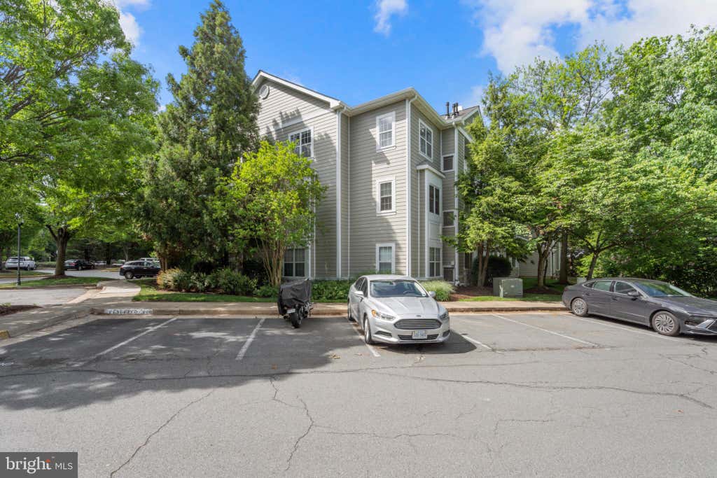 Photo of 1700 Lake Shore Crest Drive #13, RESTON, VA 20190 (MLS # VAFX2313234)