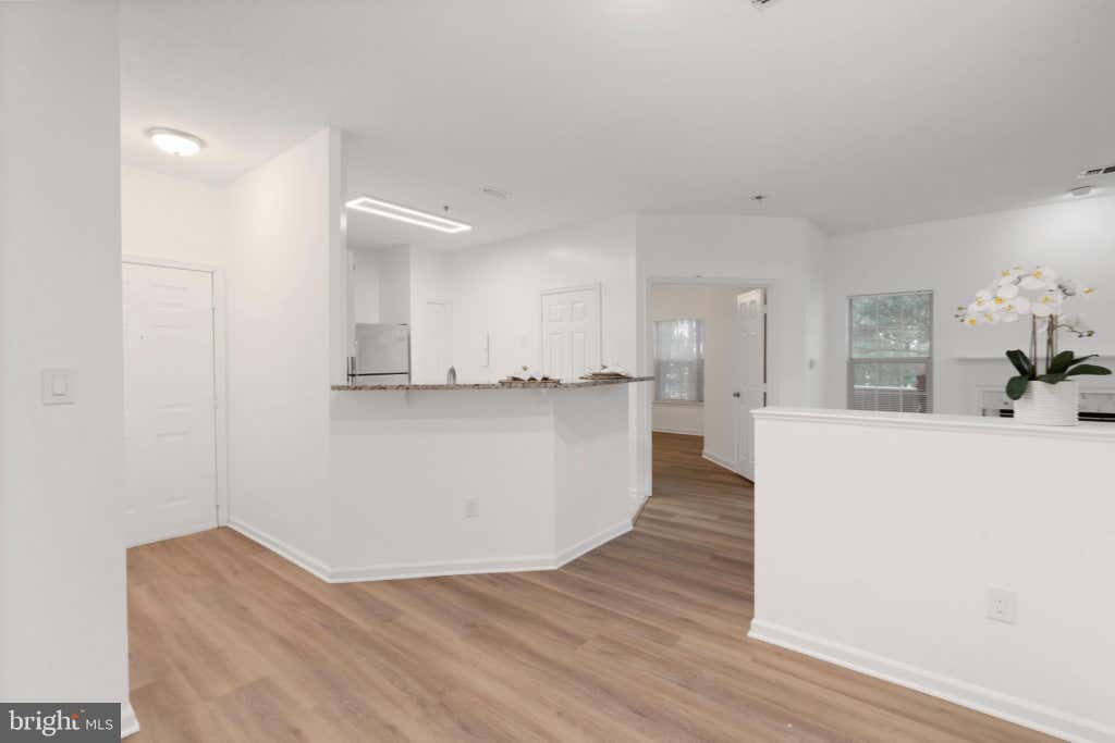 Photo of 1700 Lake Shore Crest Drive #13, RESTON, VA 20190 (MLS # VAFX2313234)